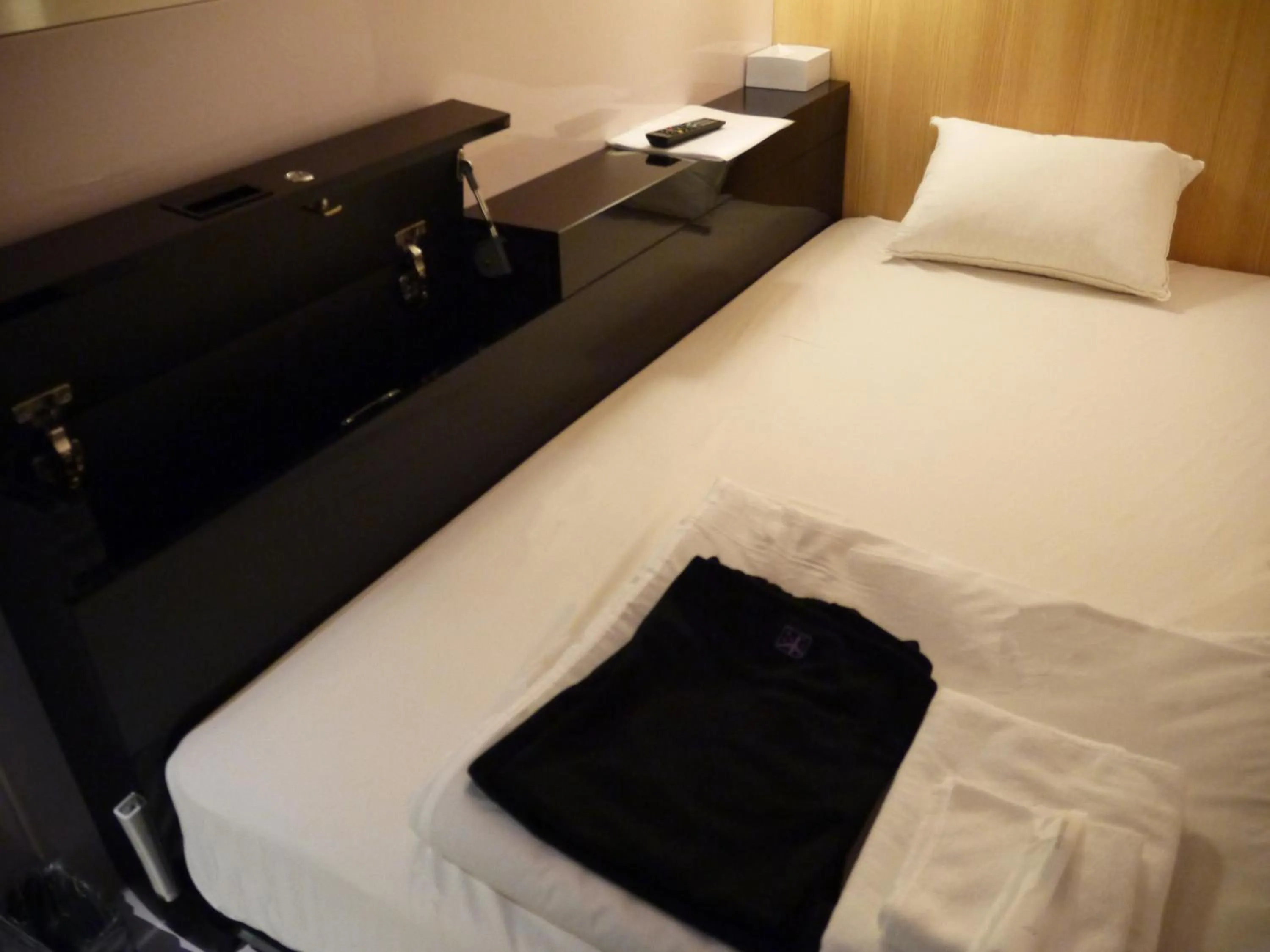 Bed in First Cabin Kansai Airport