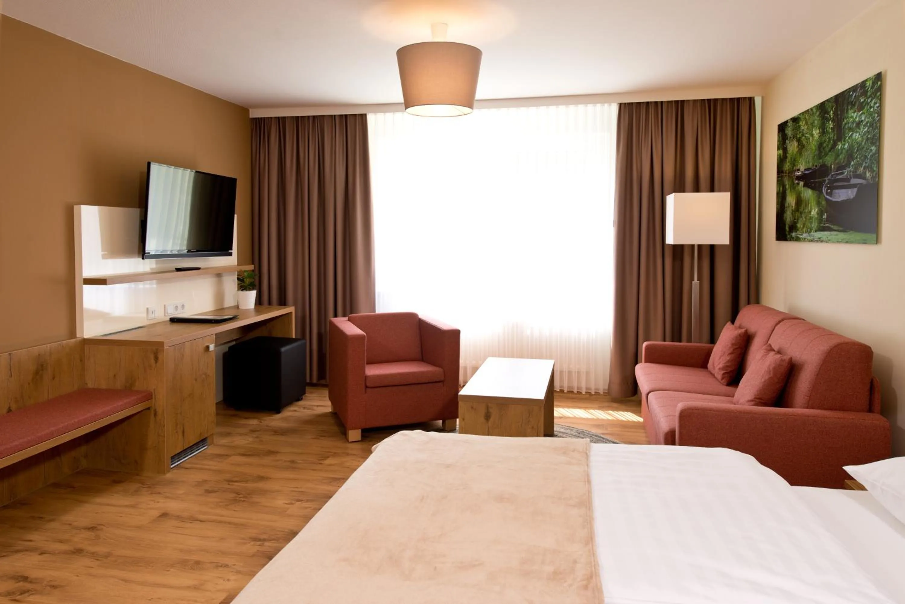 Living room, Bed in Spreewaldhotel Stephanshof