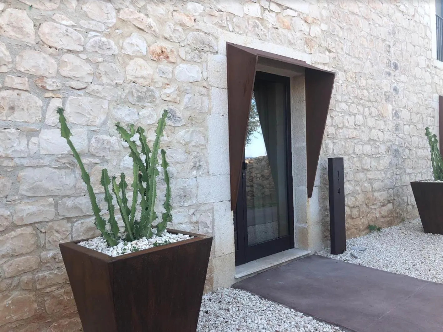 Property building in Pietra d'Acqua Resort & Spa by Geocharme