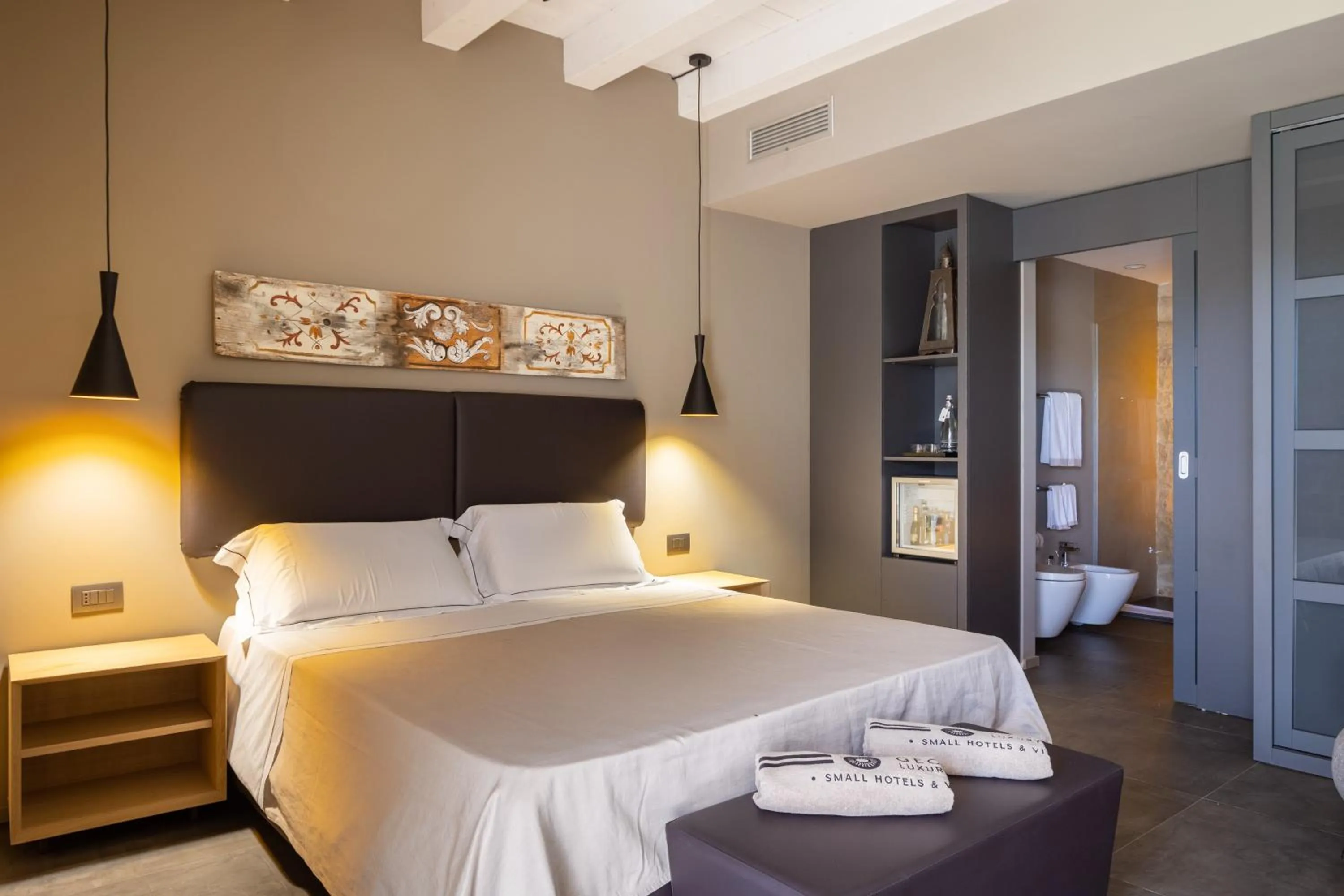 Bedroom, Bed in Pietra d'Acqua Resort & Spa by Geocharme