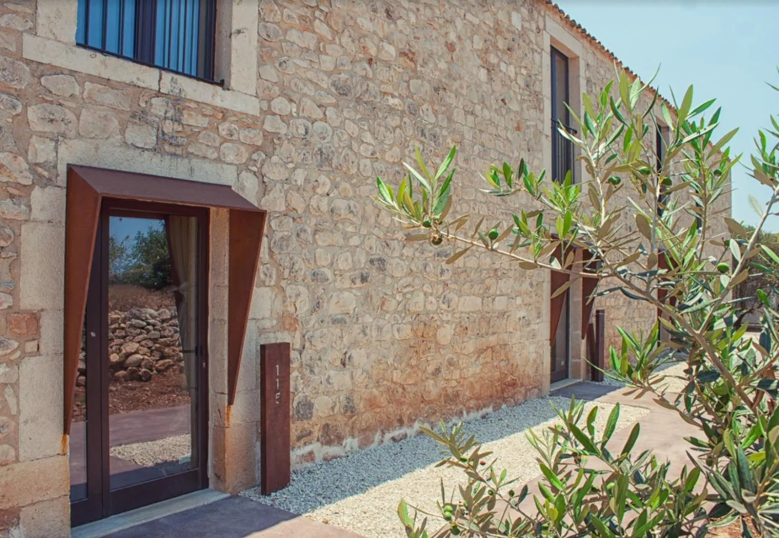 Property building in Pietra d'Acqua Resort & Spa by Geocharme