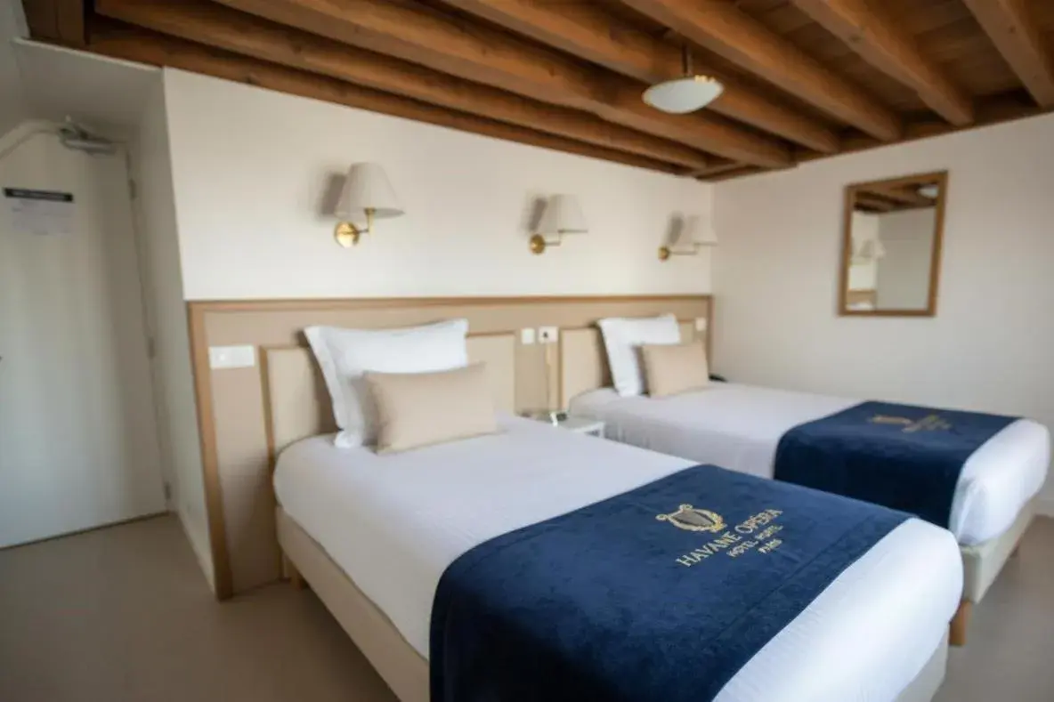 Bed in Hotel Havane Opera Bed in Hotel Havane Opera