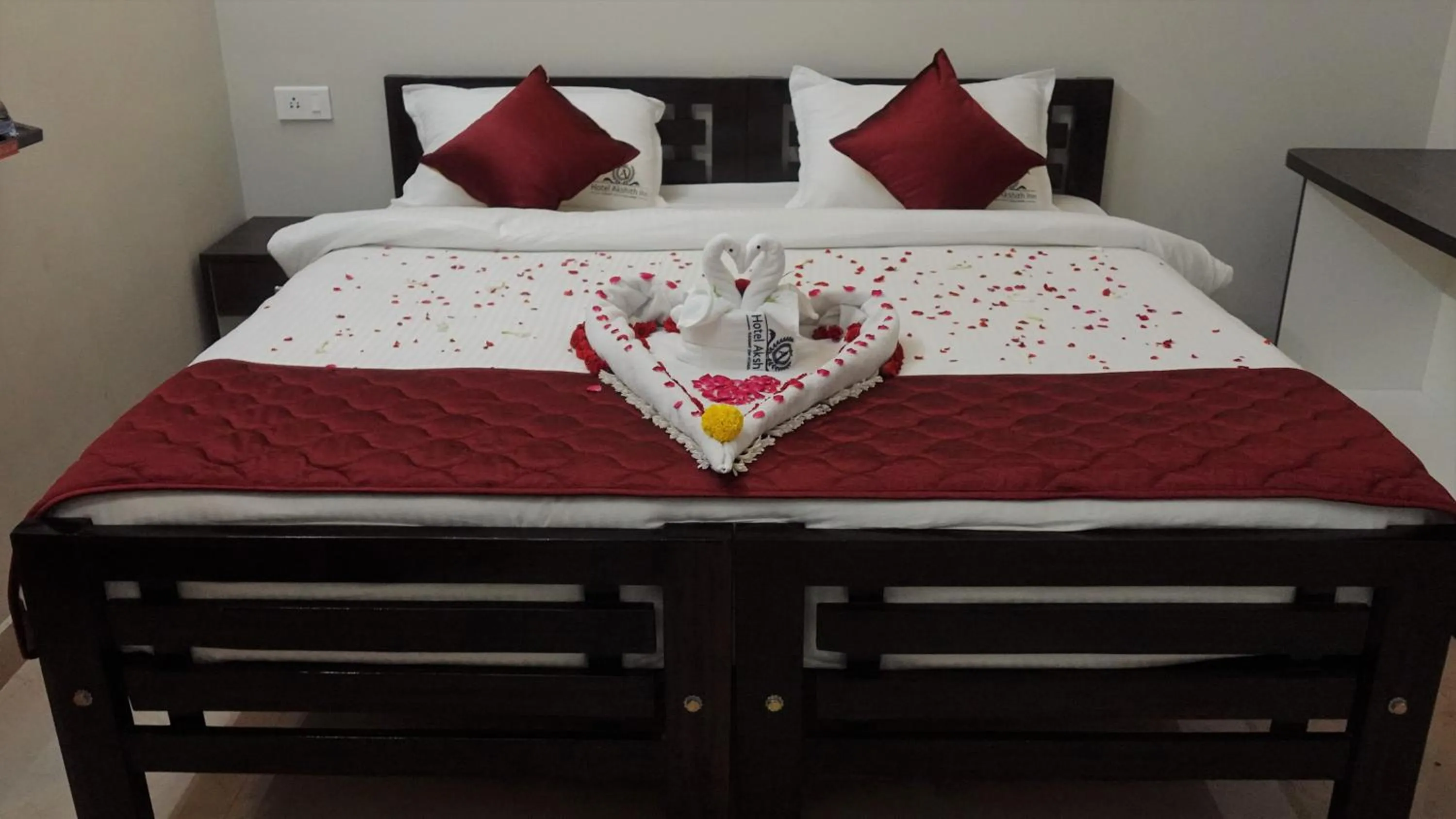 Photo of the whole room, Bed in Hotel Akshith Inn