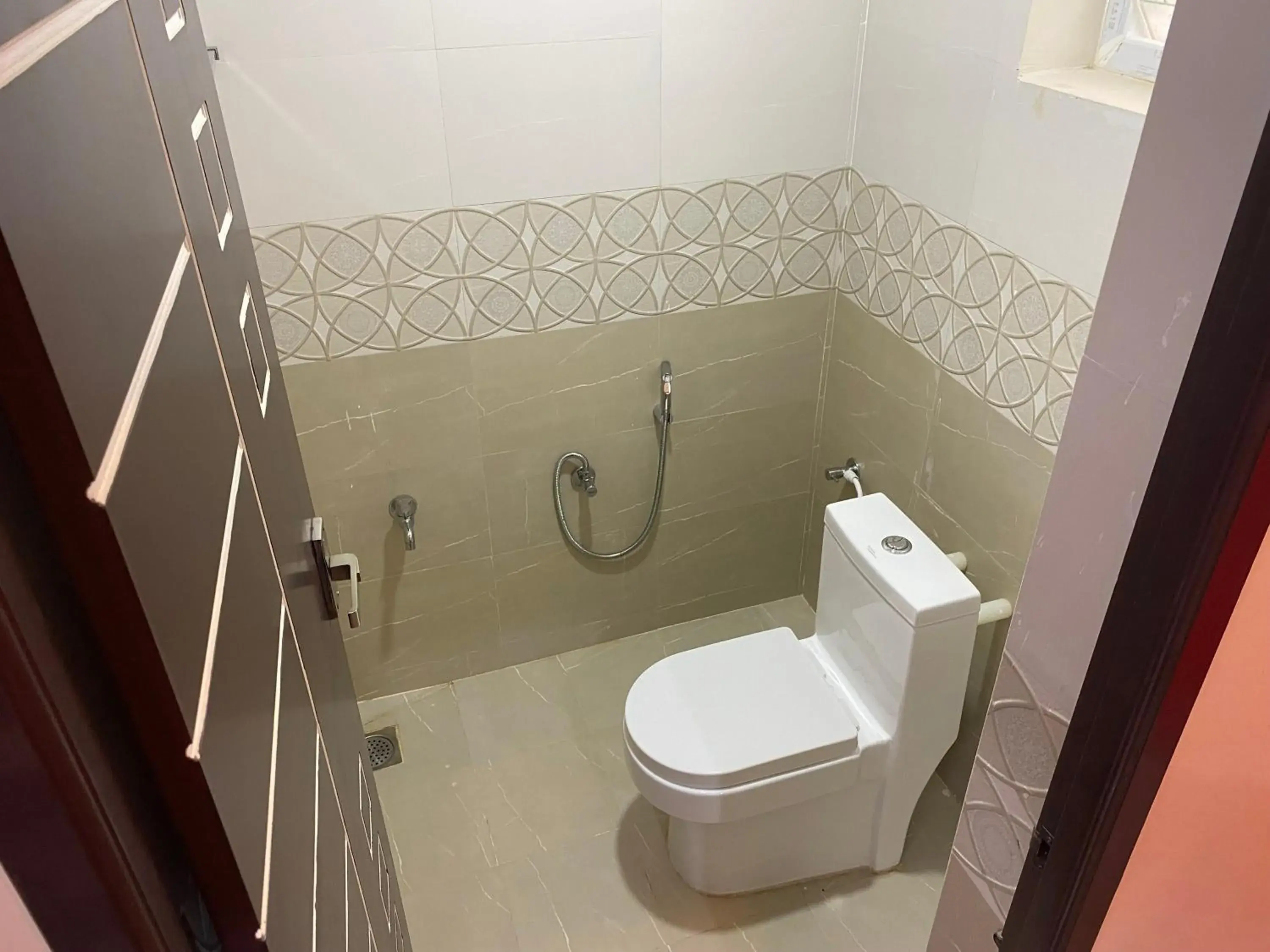 Toilet in Hotel Akshith Inn Toilet in Hotel Akshith Inn