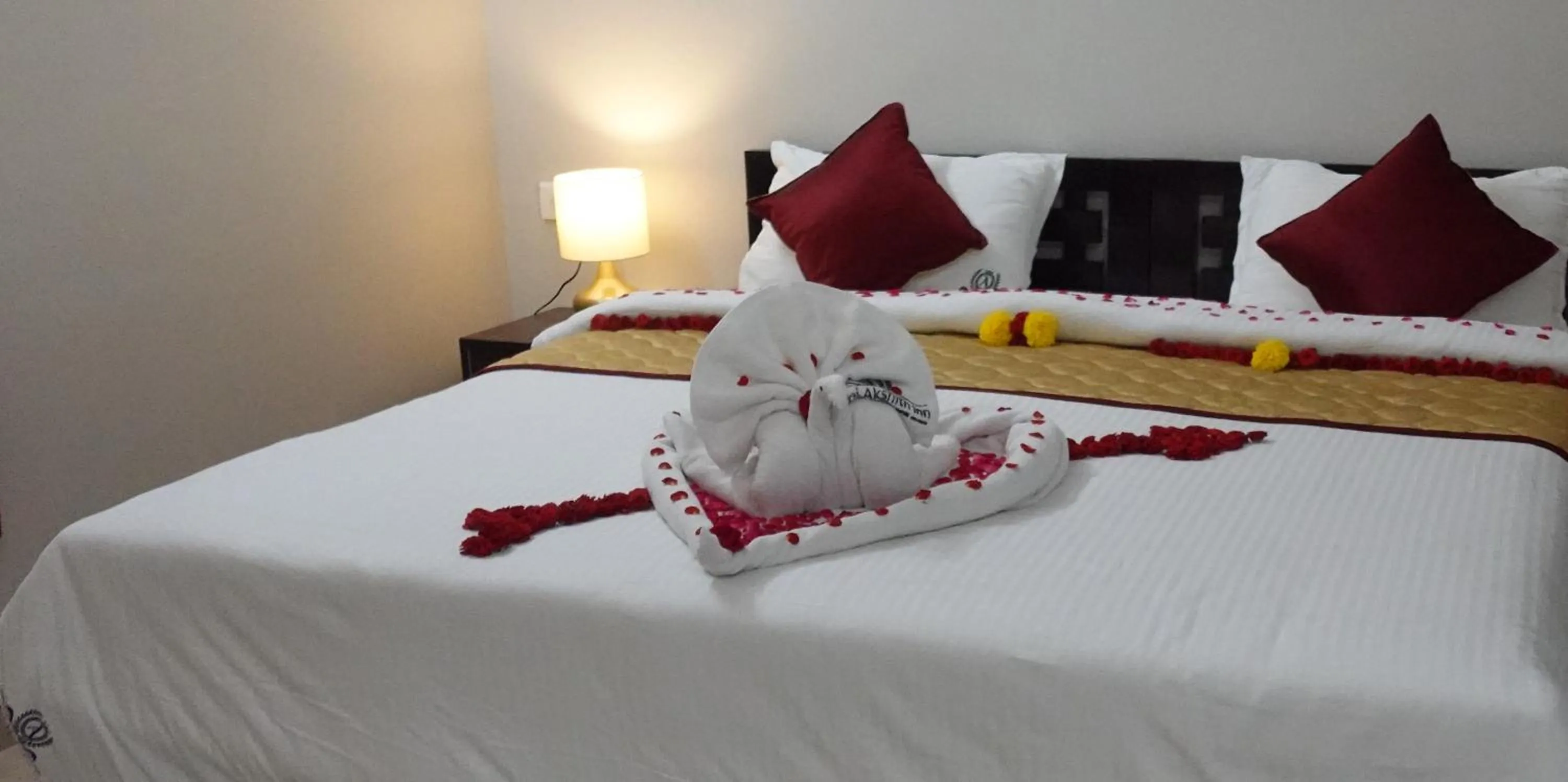 Bed in Hotel Akshith Inn