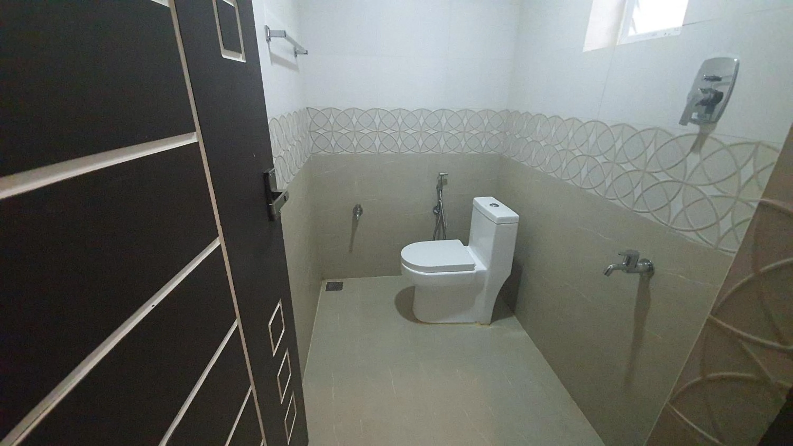 Bathroom in Hotel Akshith Inn