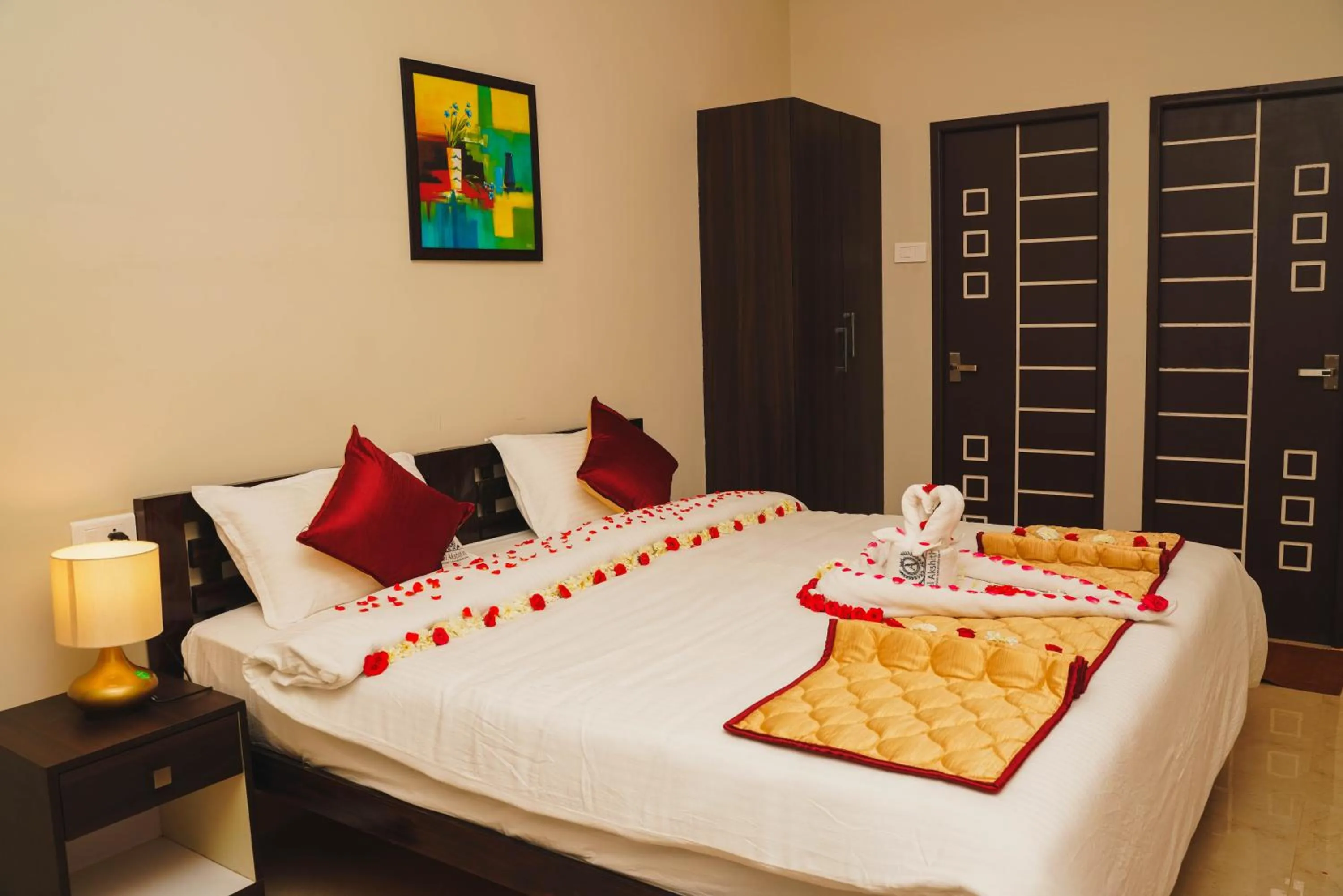 Bed in Hotel Akshith Inn