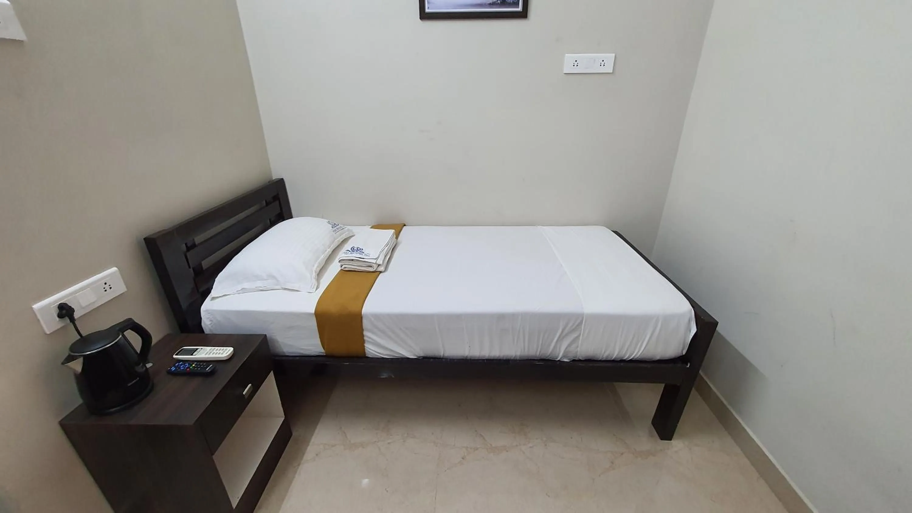 Bed in Hotel Akshith Inn