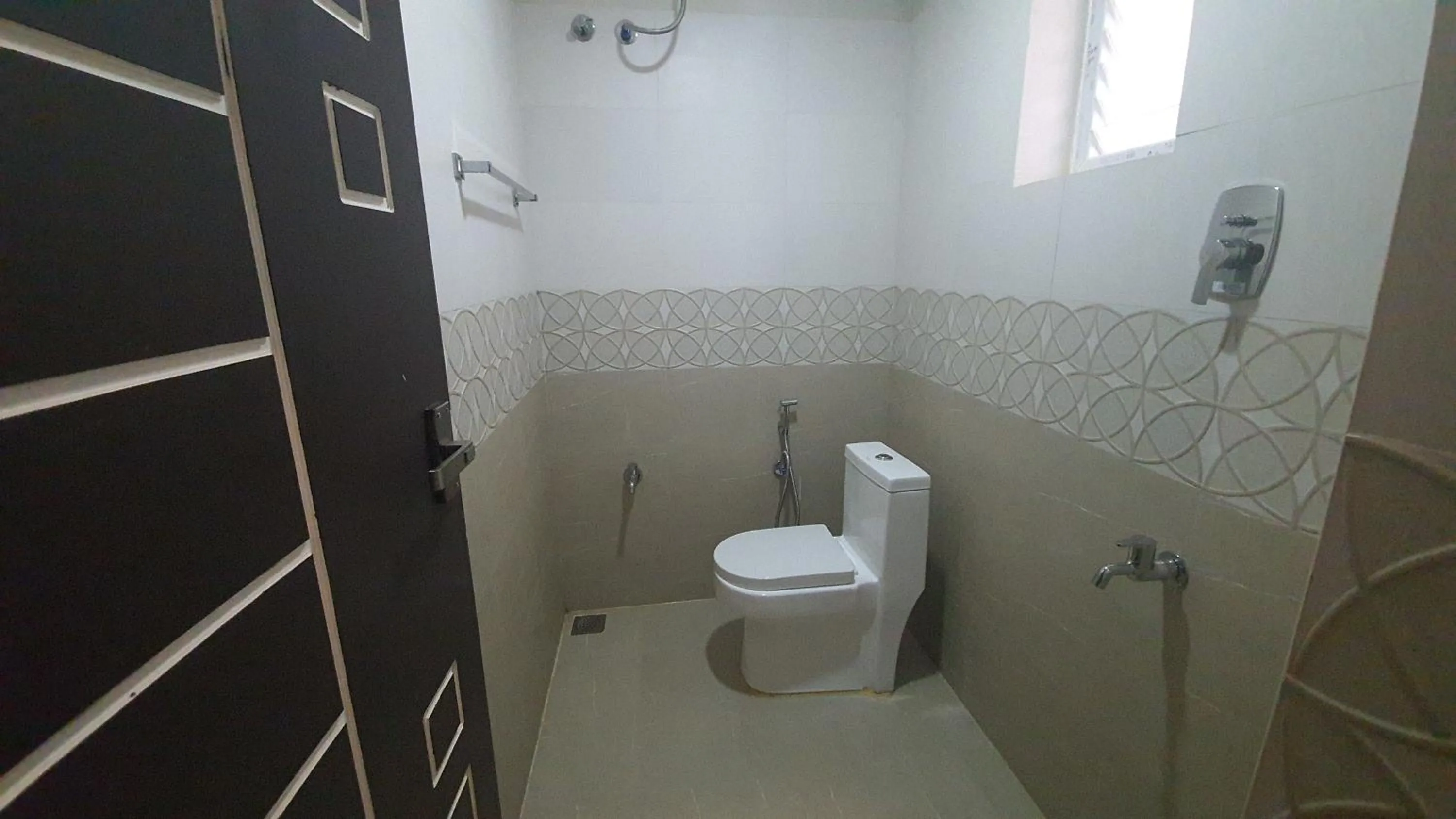 Bathroom in Hotel Akshith Inn