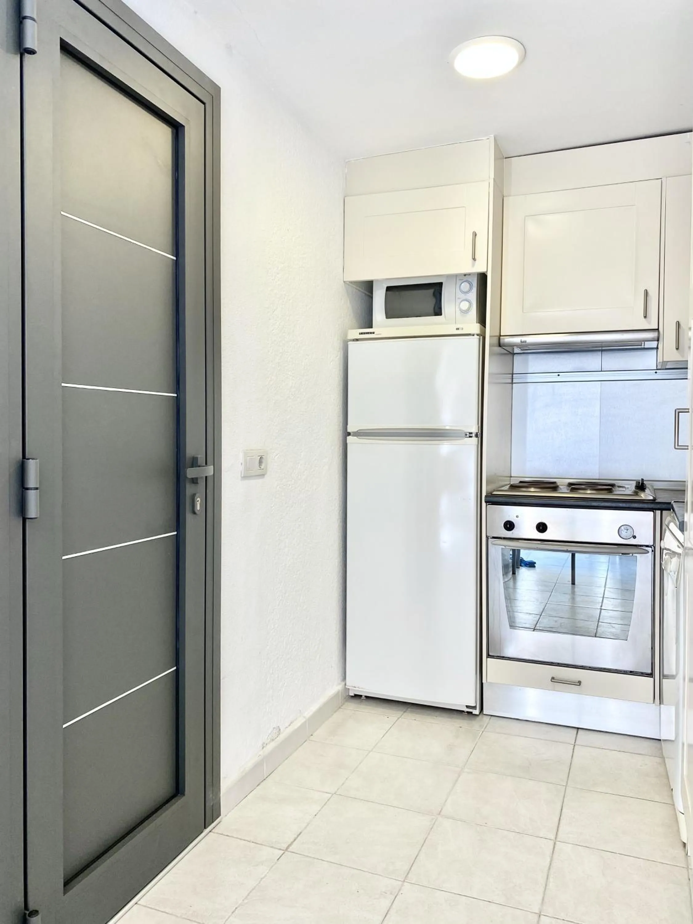 Kitchen or kitchenette in Apartamentos Stella Maris