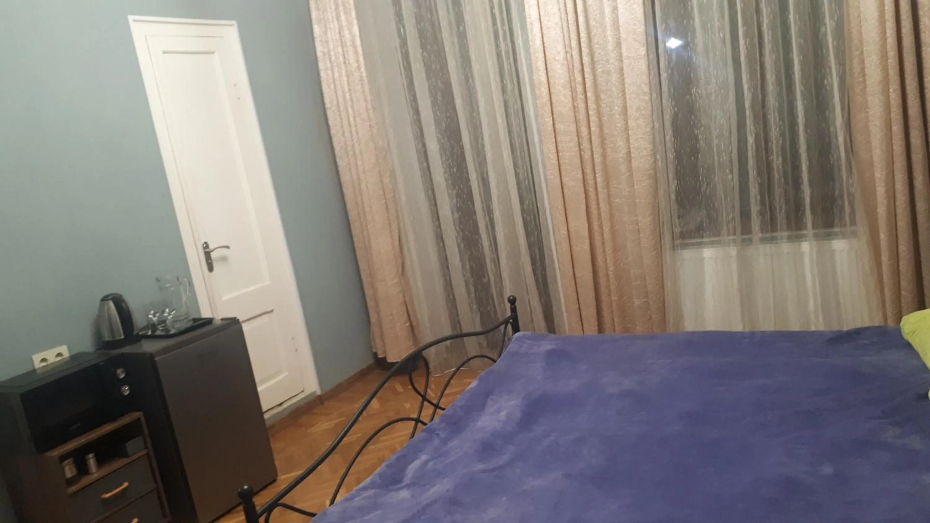 Property building, Bed in Sunflower Hotel