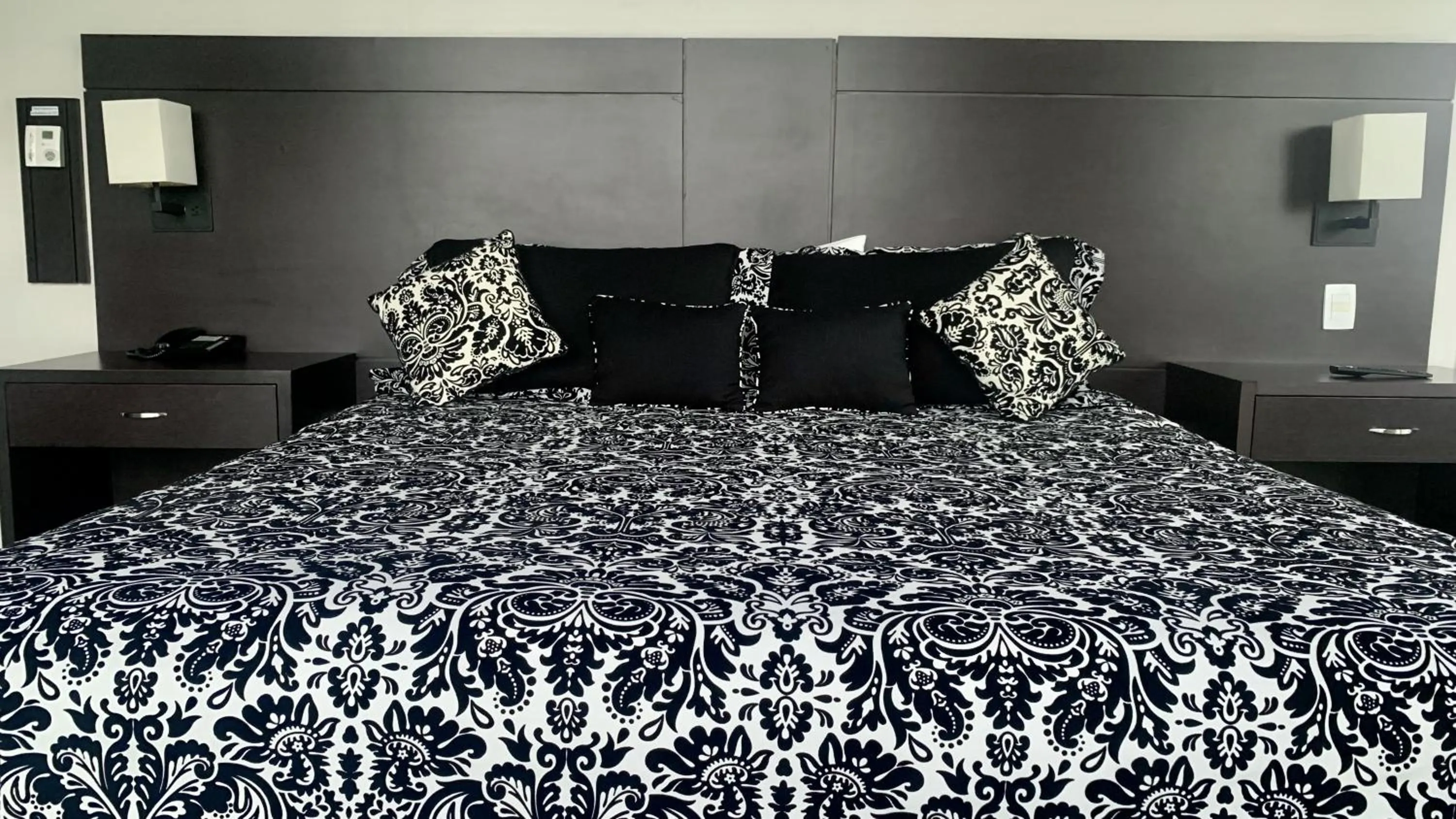 Bed in HOTEL CHACAO SUITES