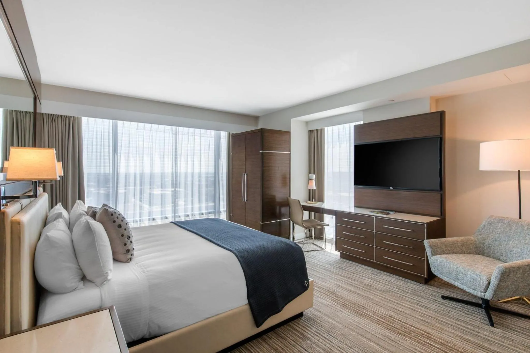 Photo of the whole room, Bed in Omni Frisco at The Star