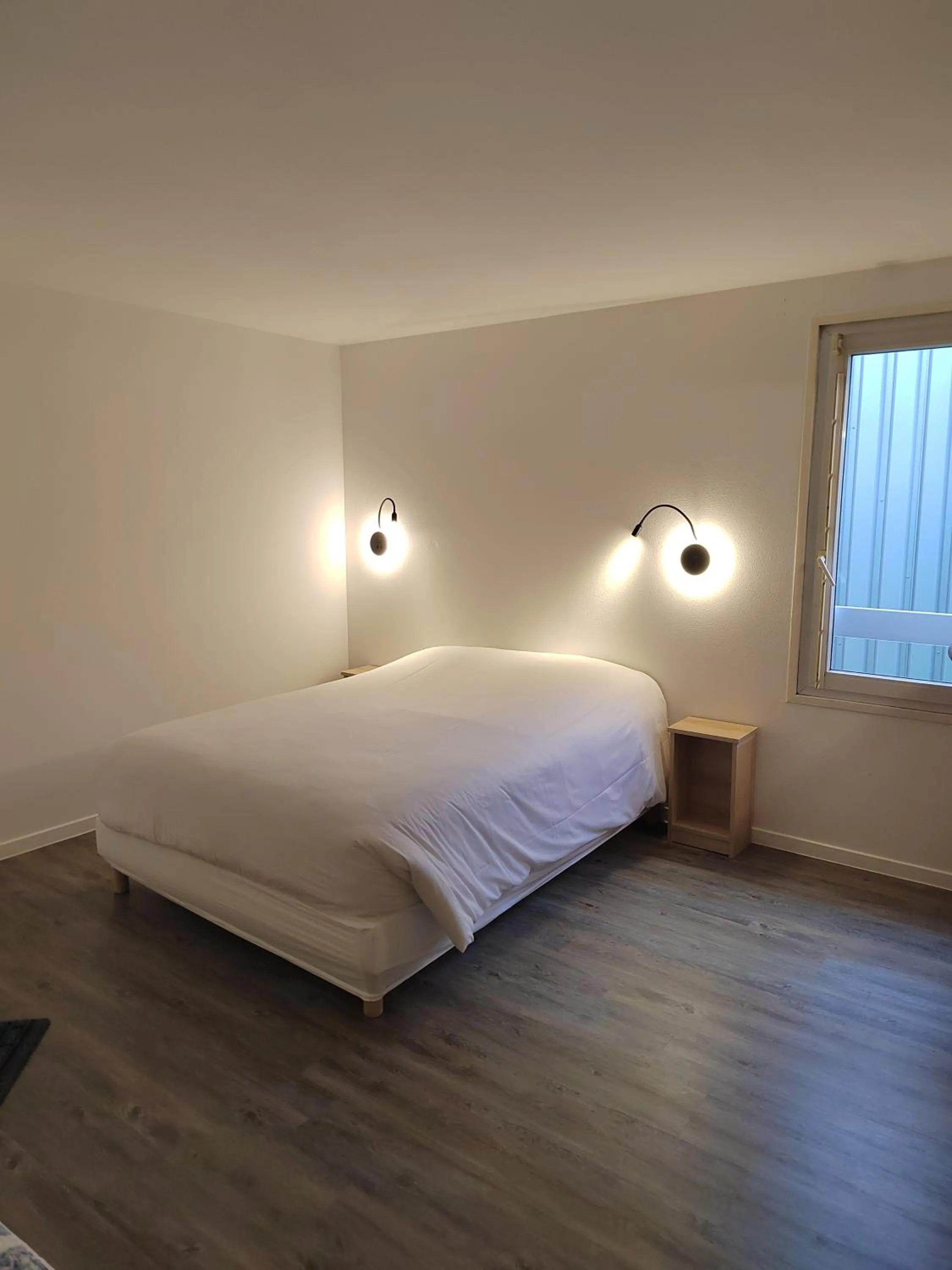 Bed in FASTHOTEL PARIS OUEST BOUAFLE