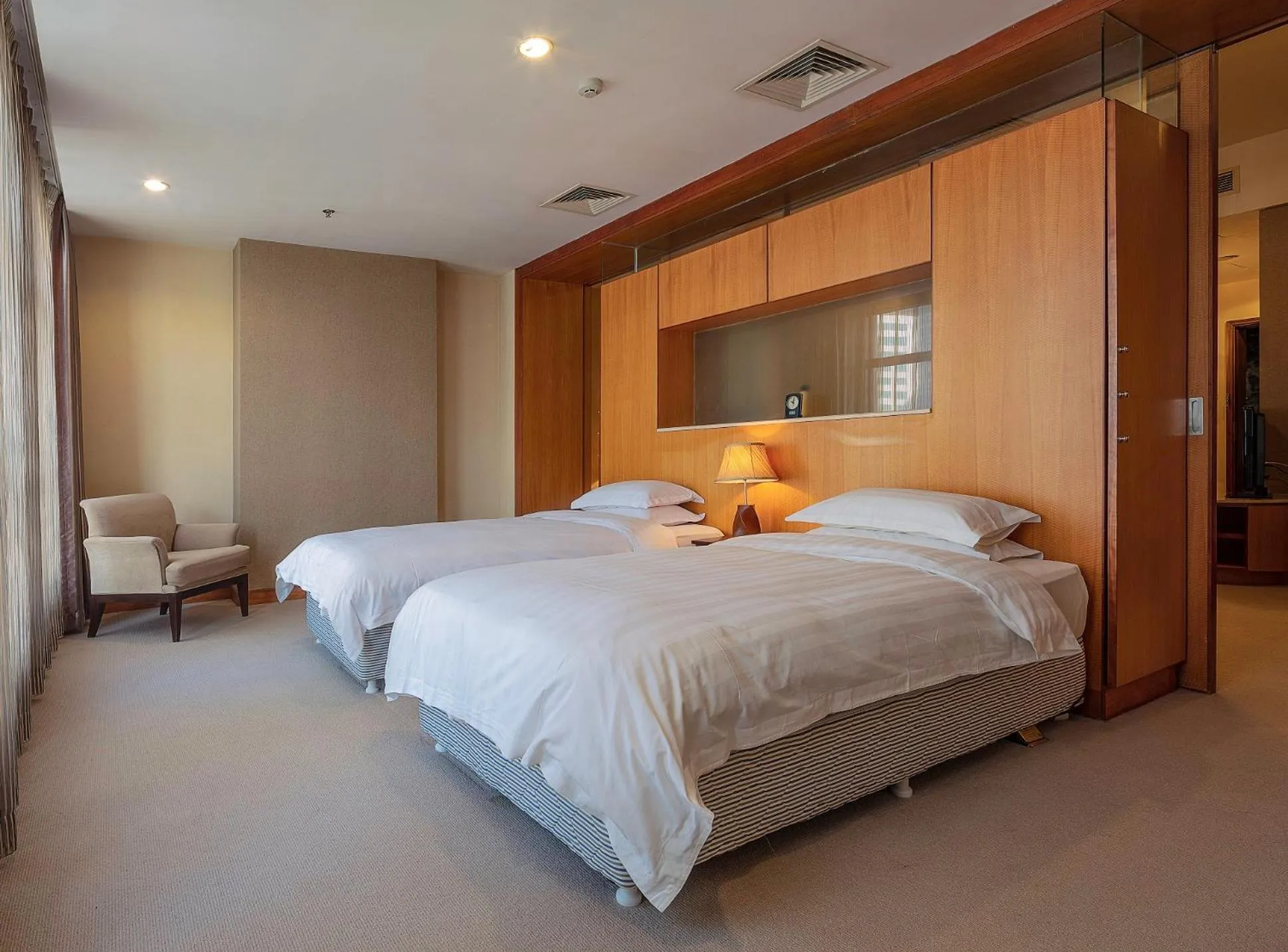 Bed in Dalian Asia Pacific Service Apartment (Former Somerset Harbour Court Dalian)