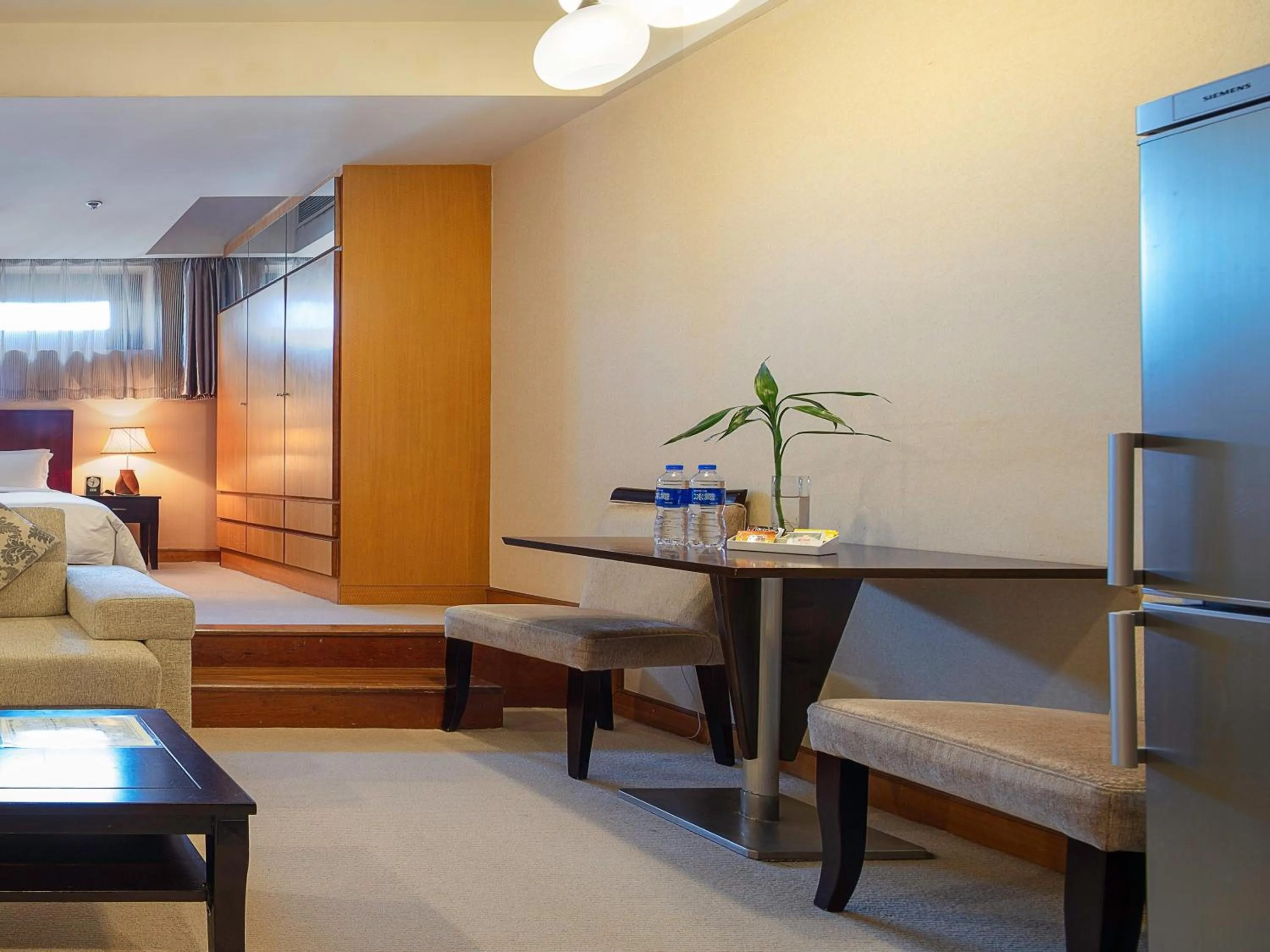 Bed in Dalian Asia Pacific Service Apartment (Former Somerset Harbour Court Dalian)