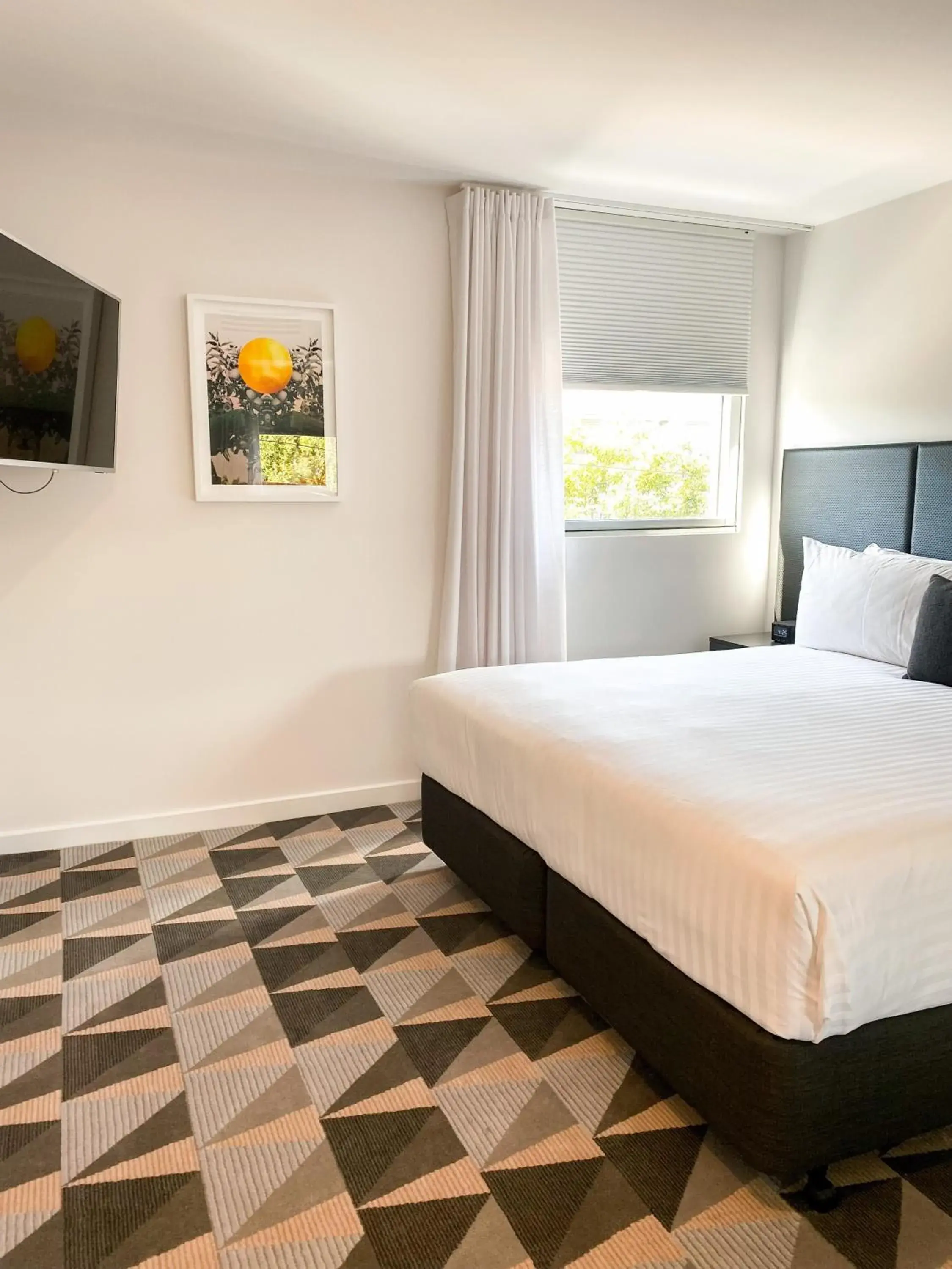 Bed in The Gem Hotel Bed in The Gem Hotel