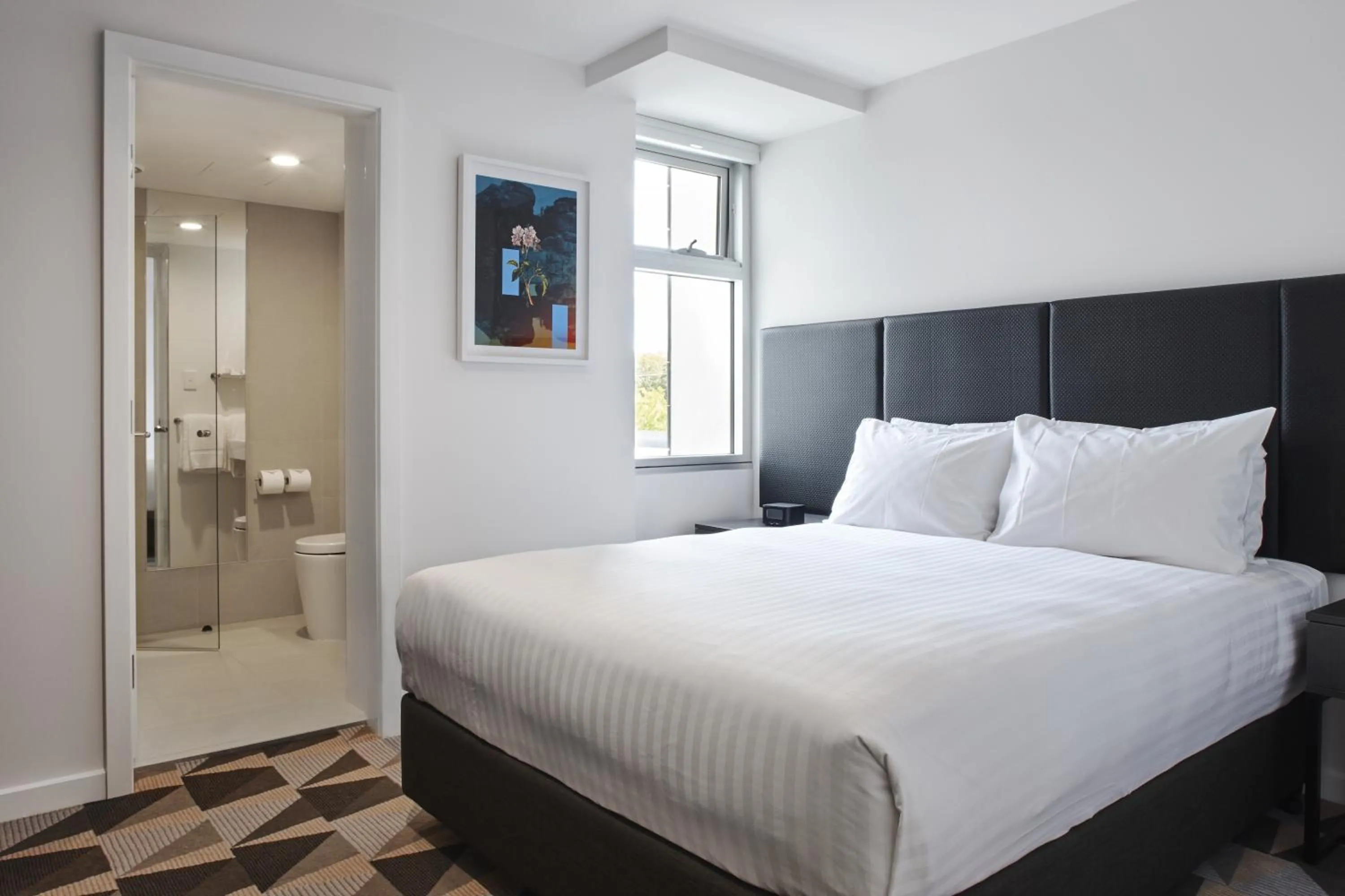 Bed in The Gem Hotel