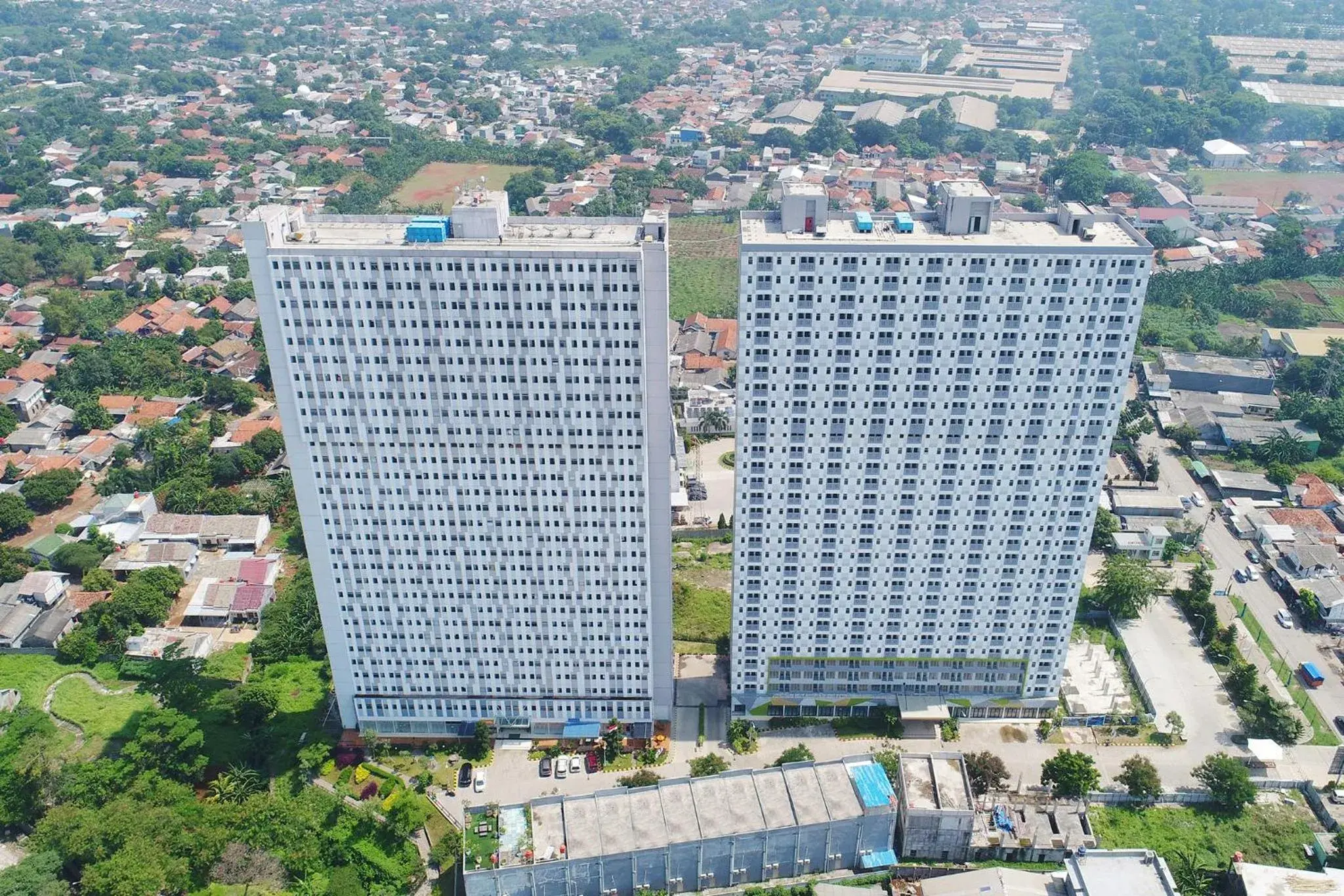 Property building in Apartemen Gunung Putri Square by Sirooms Property building in Apartemen Gunung Putri Square by Sirooms