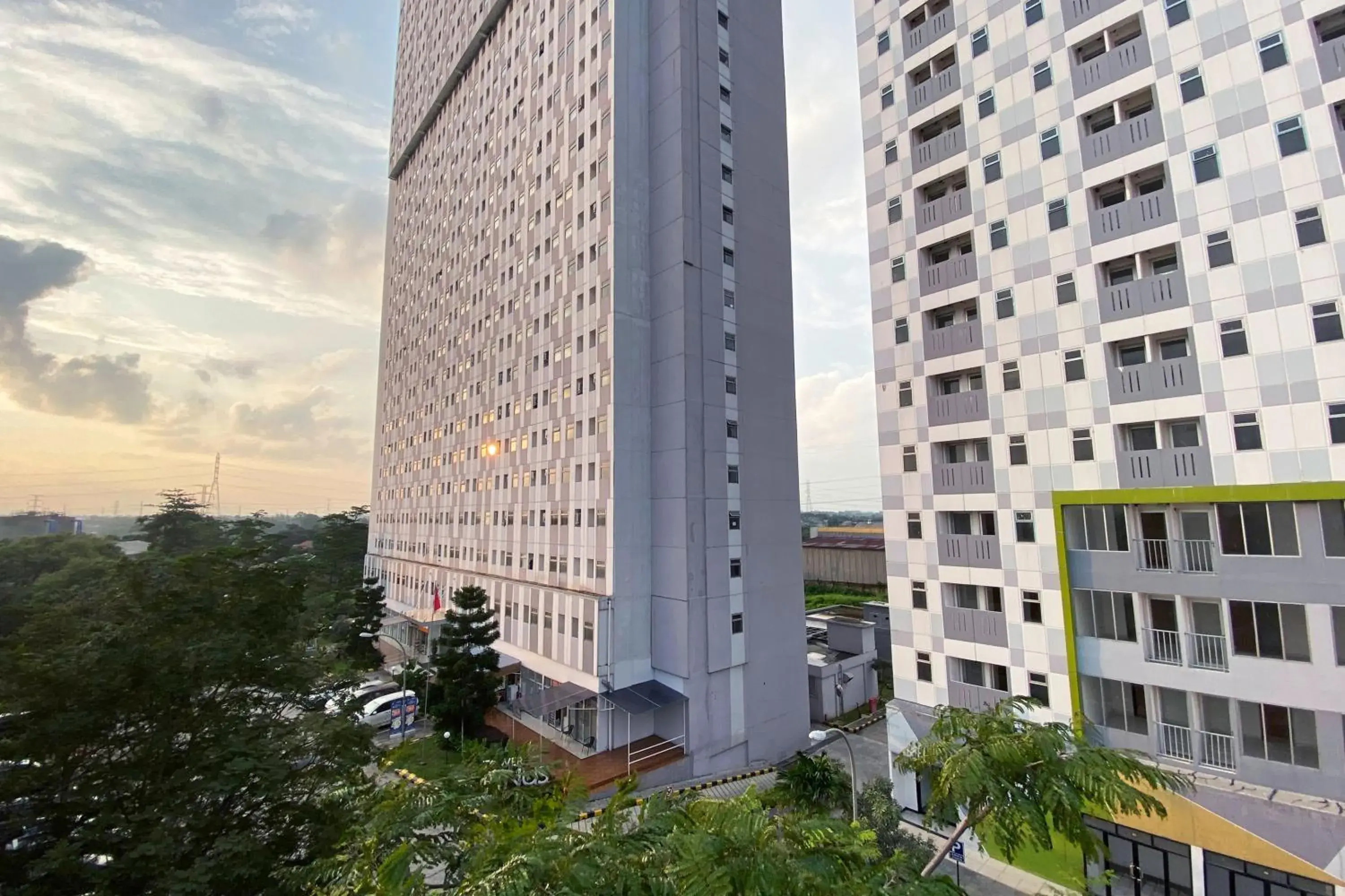 Property building in Apartemen Gunung Putri Square by Sirooms Property building in Apartemen Gunung Putri Square by Sirooms
