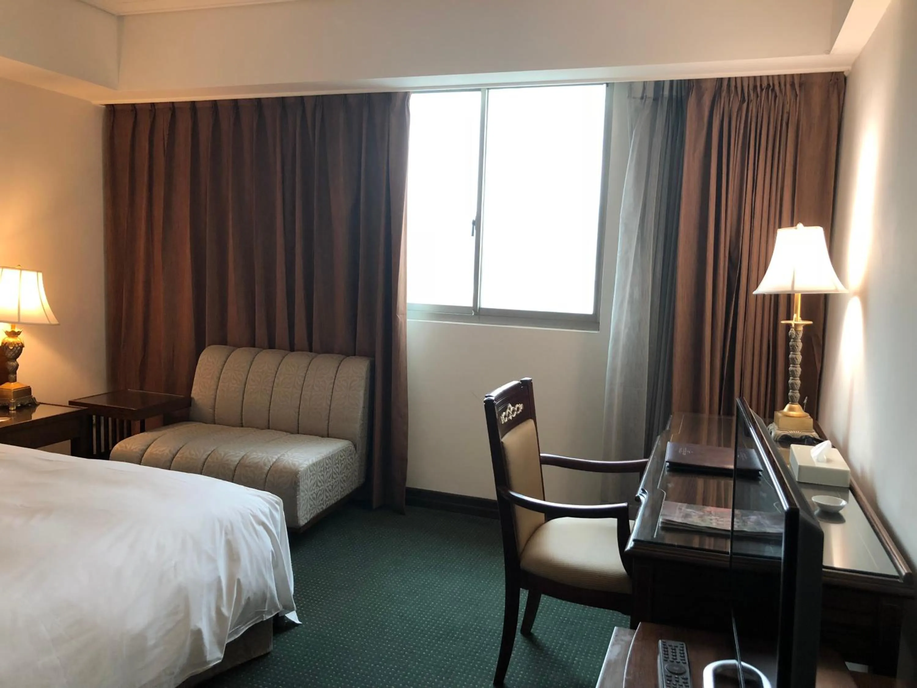 Seating area, Bed in Hotel RegaLees