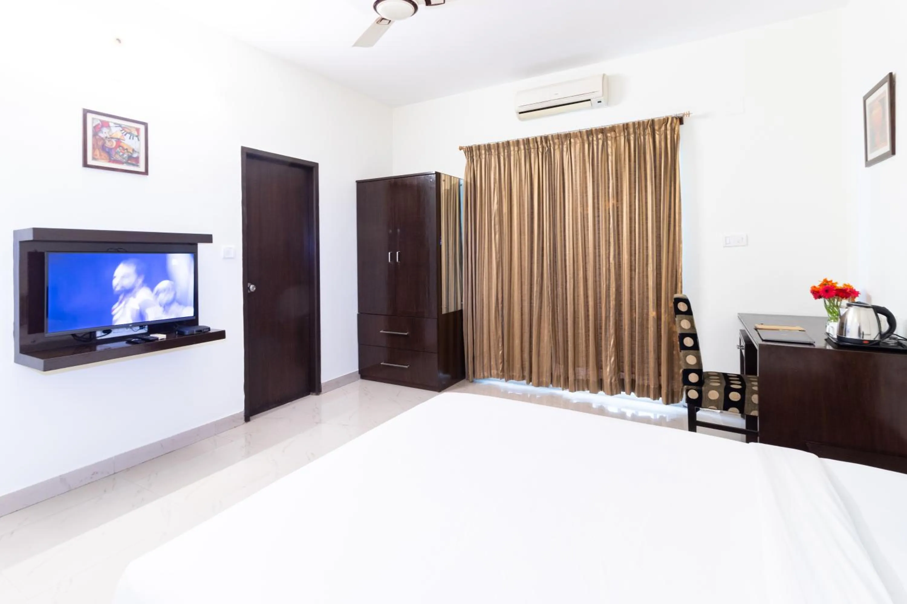 TV and multimedia, Bed in Sanctum Suites Domlur Bangalore