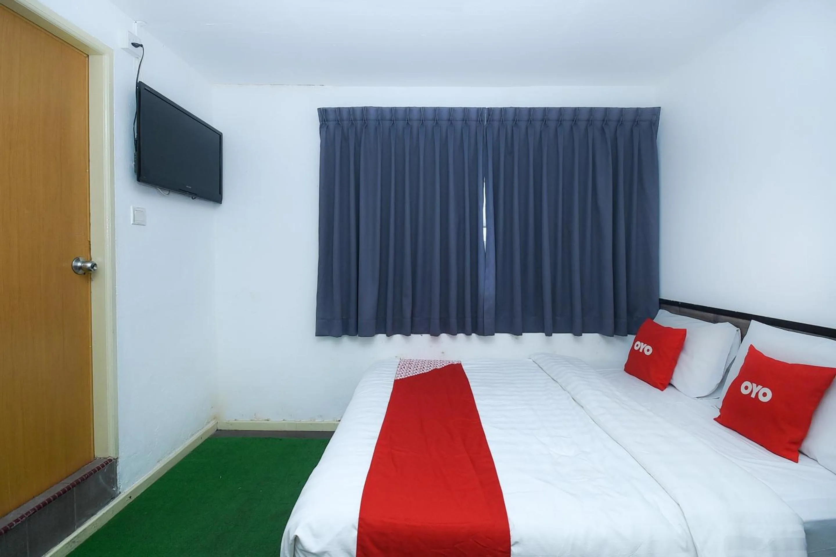 Bedroom in Hotel O River Inn