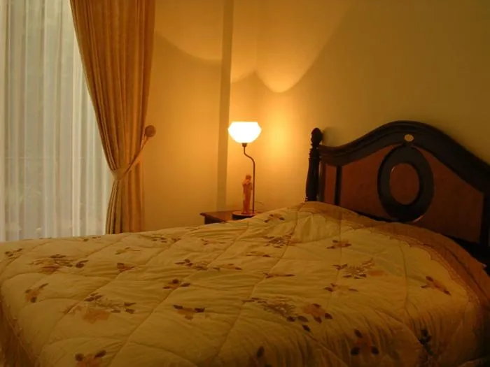 Bed in Margot Apartment Pondok Indah