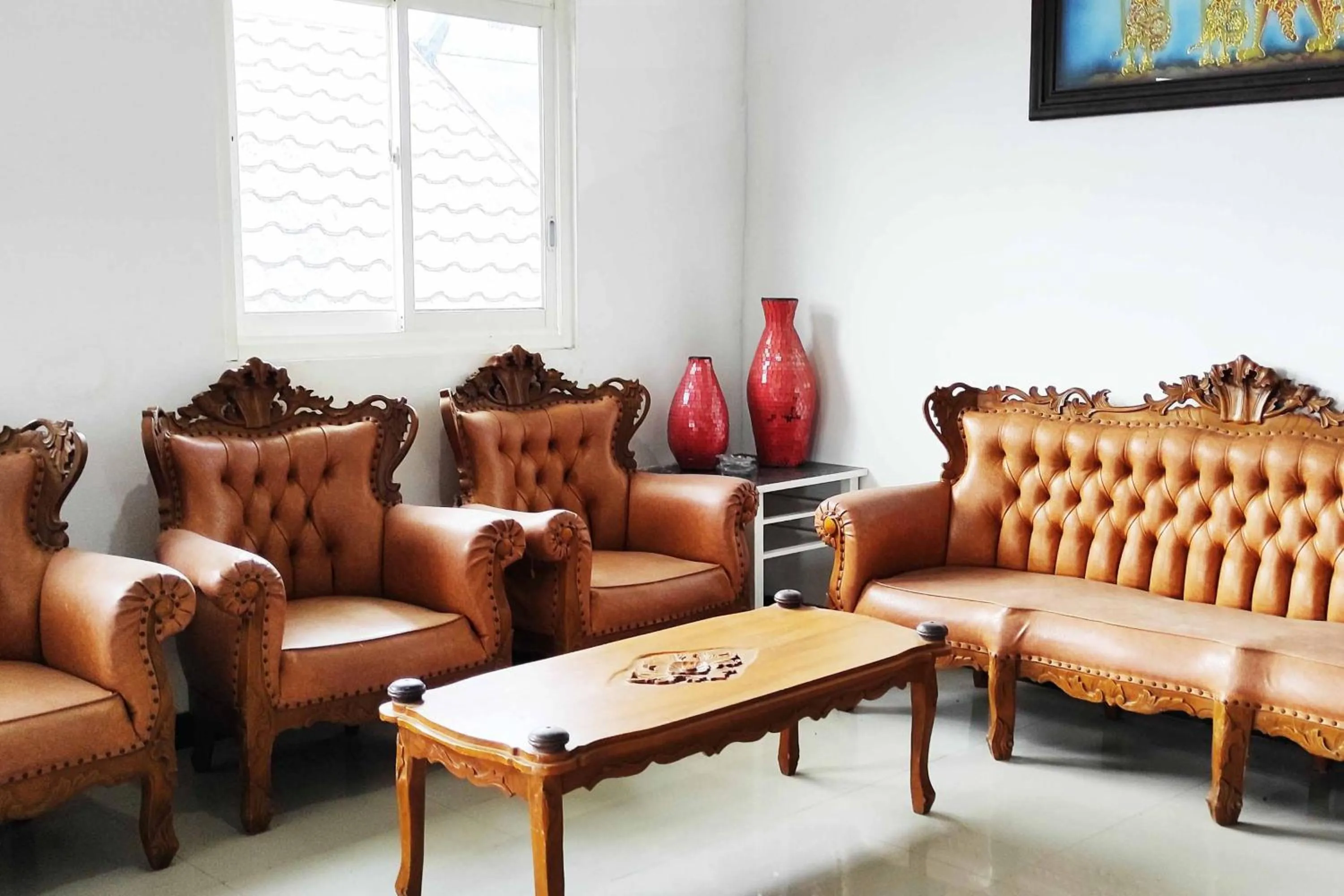 Living room in Pertiwi Homestay Near Museum Angkut Batu Mitra RedDoorz