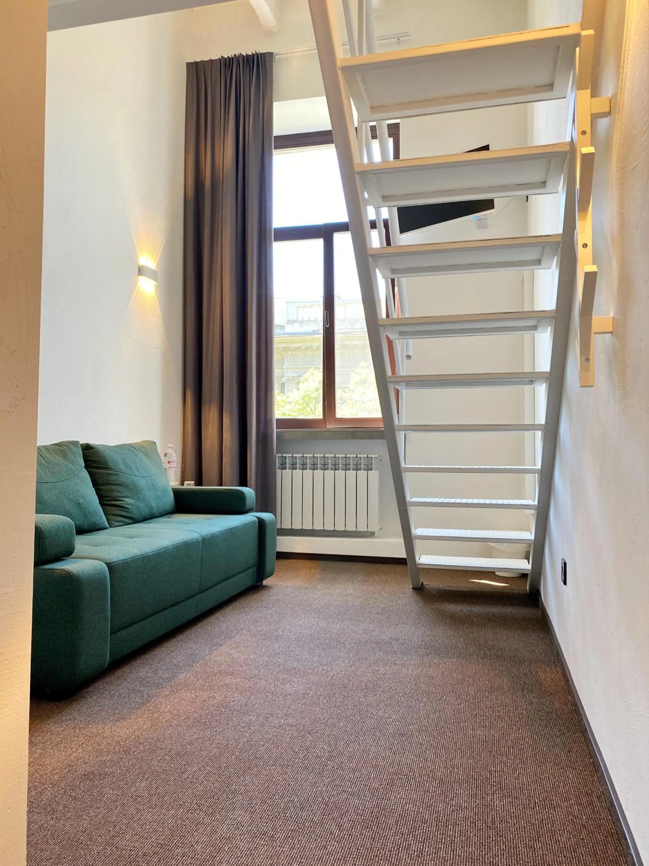 Seating area in Lift Hotel Boutique - Derybasivska