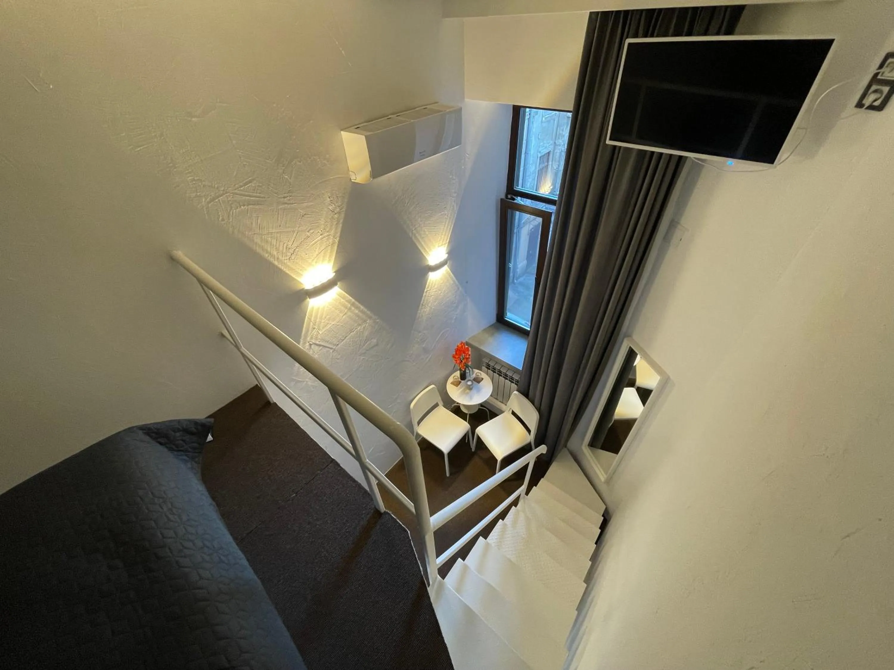 Communal lounge/ TV room in Lift Hotel Boutique - Derybasivska