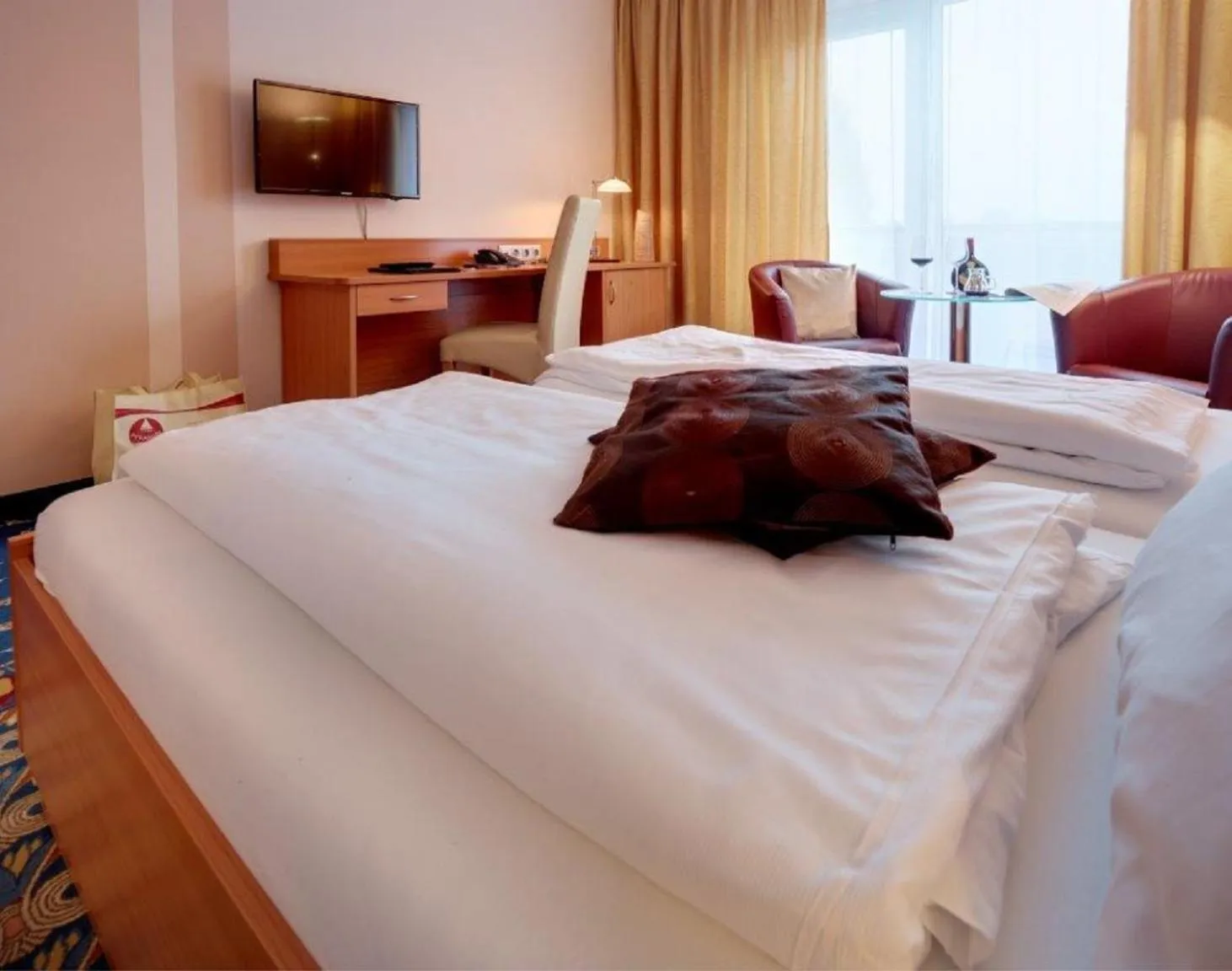 Photo of the whole room, Bed in Kurhotel Pyramide Bad Windsheim