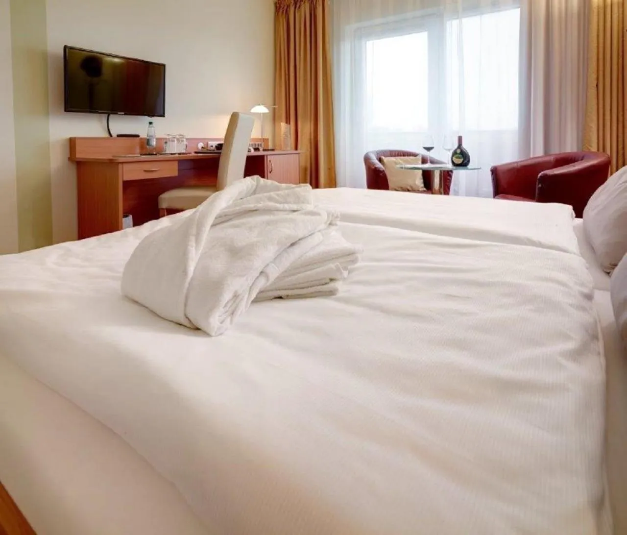 Photo of the whole room, Bed in Kurhotel Pyramide Bad Windsheim