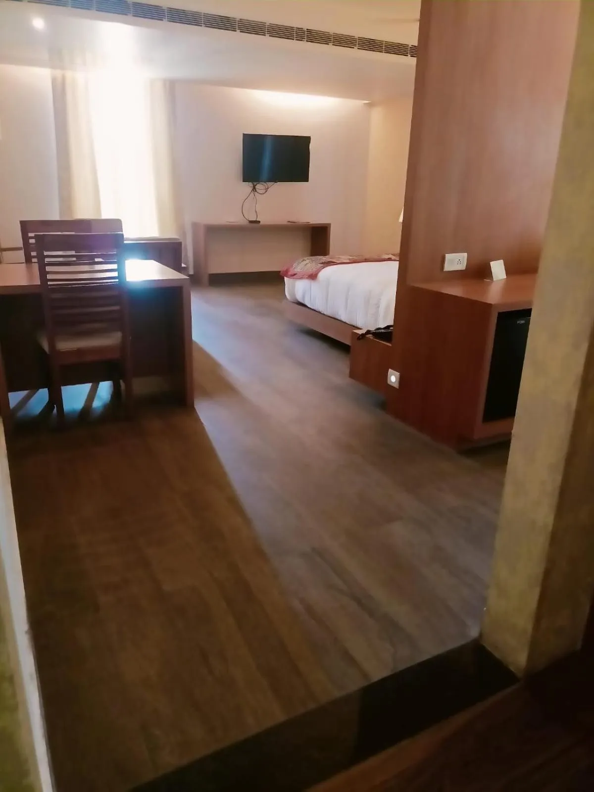 Communal lounge/ TV room, Bed in Abhyagama Hotel