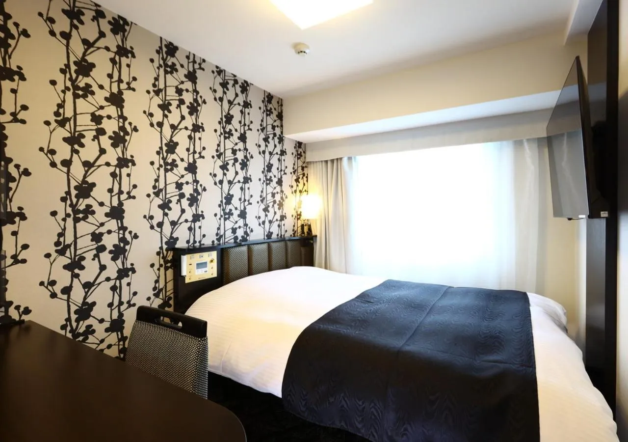 Photo of the whole room, Bed in APA Hotel Ueno Ekimae