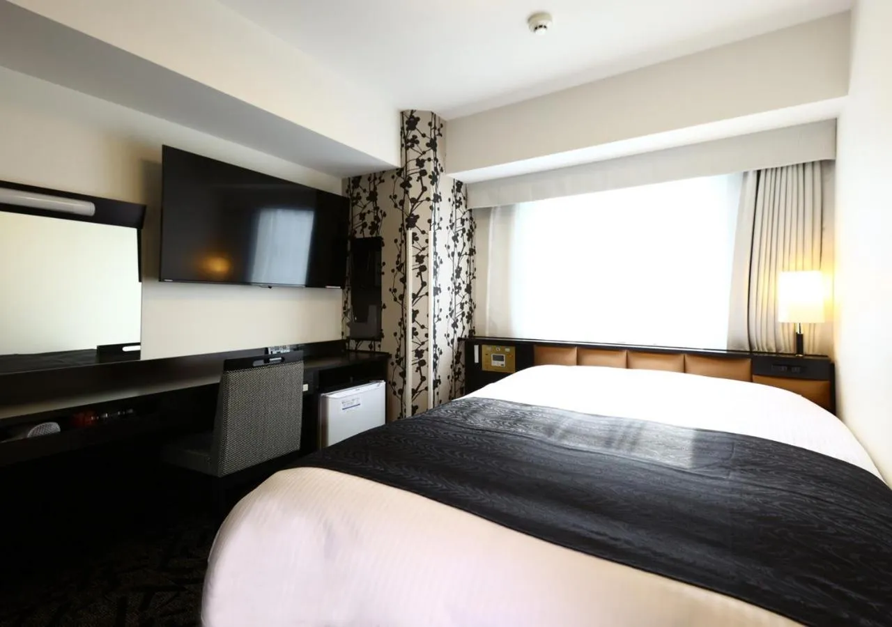 Photo of the whole room, Bed in APA Hotel Ueno Ekimae