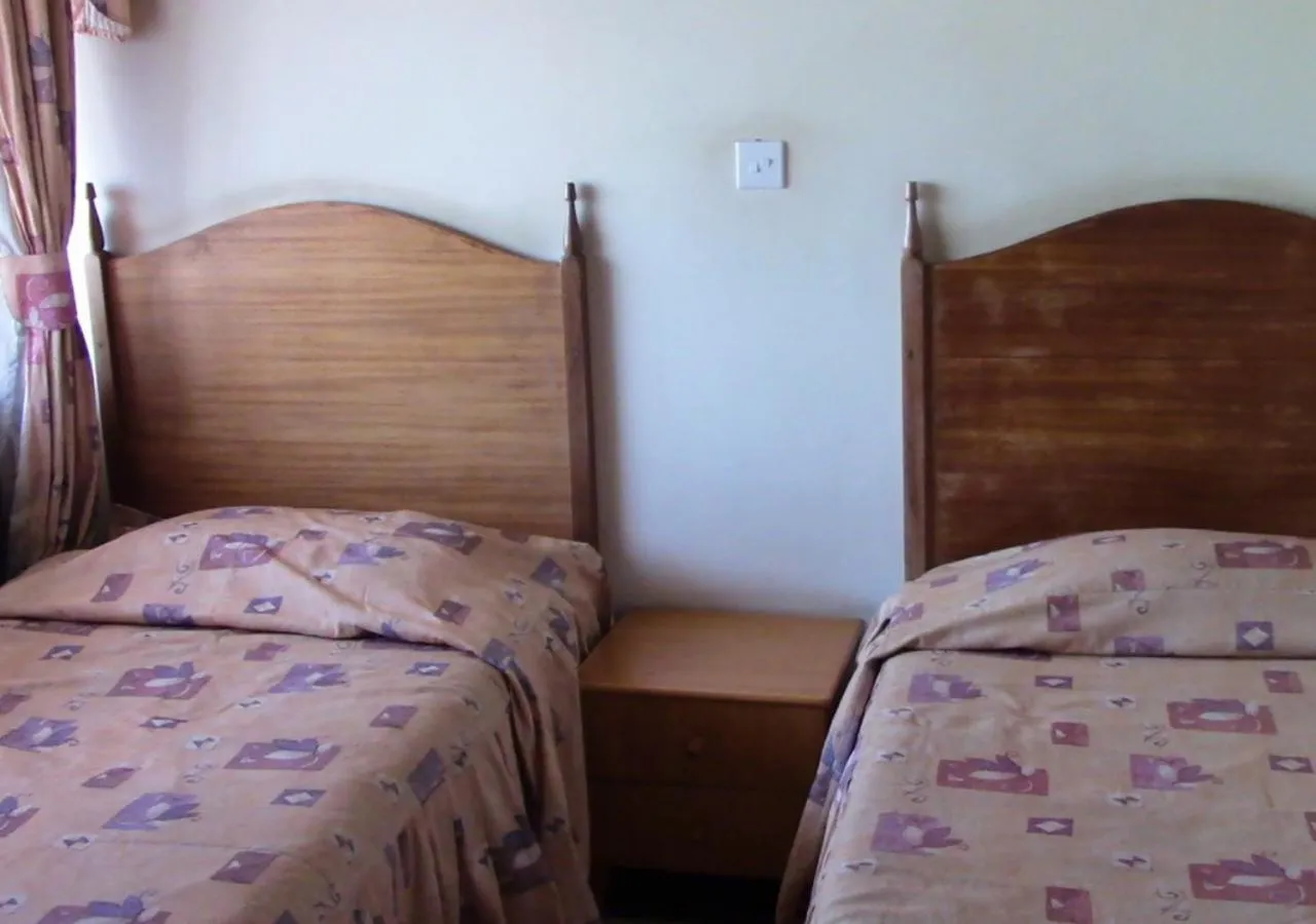 Bed in Klique Hotel Eldoret