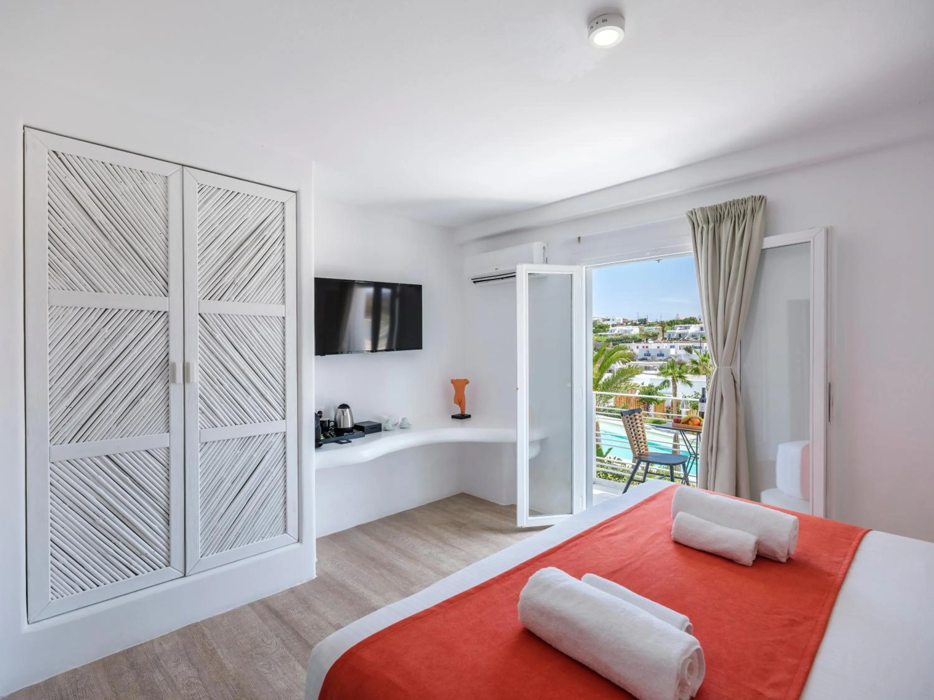 Communal lounge/ TV room, Bed in Axel Beach Mykonos - Adults Only