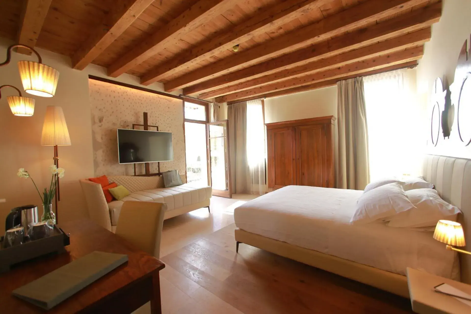 Suite with River View in Corte Regia Relais & Spa Suite with River View in Corte Regia Relais & Spa
