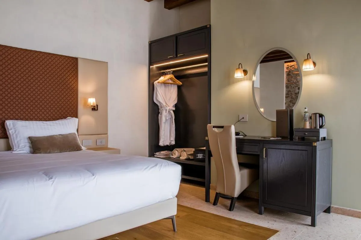 Kitchen or kitchenette, Bed in Corte Regia Relais & Spa