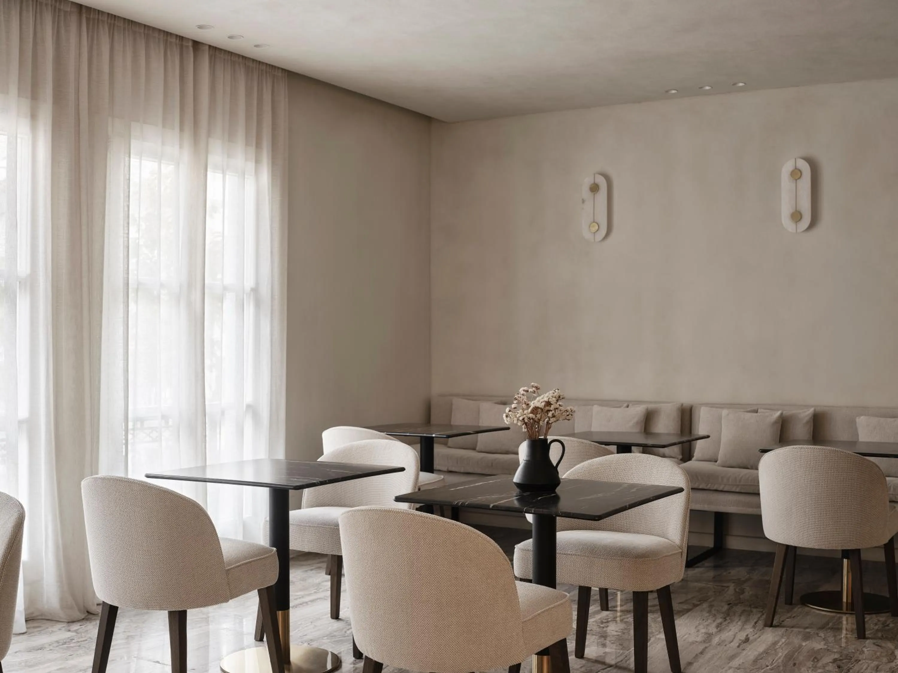 Dining area in Doryssa Method Hotel