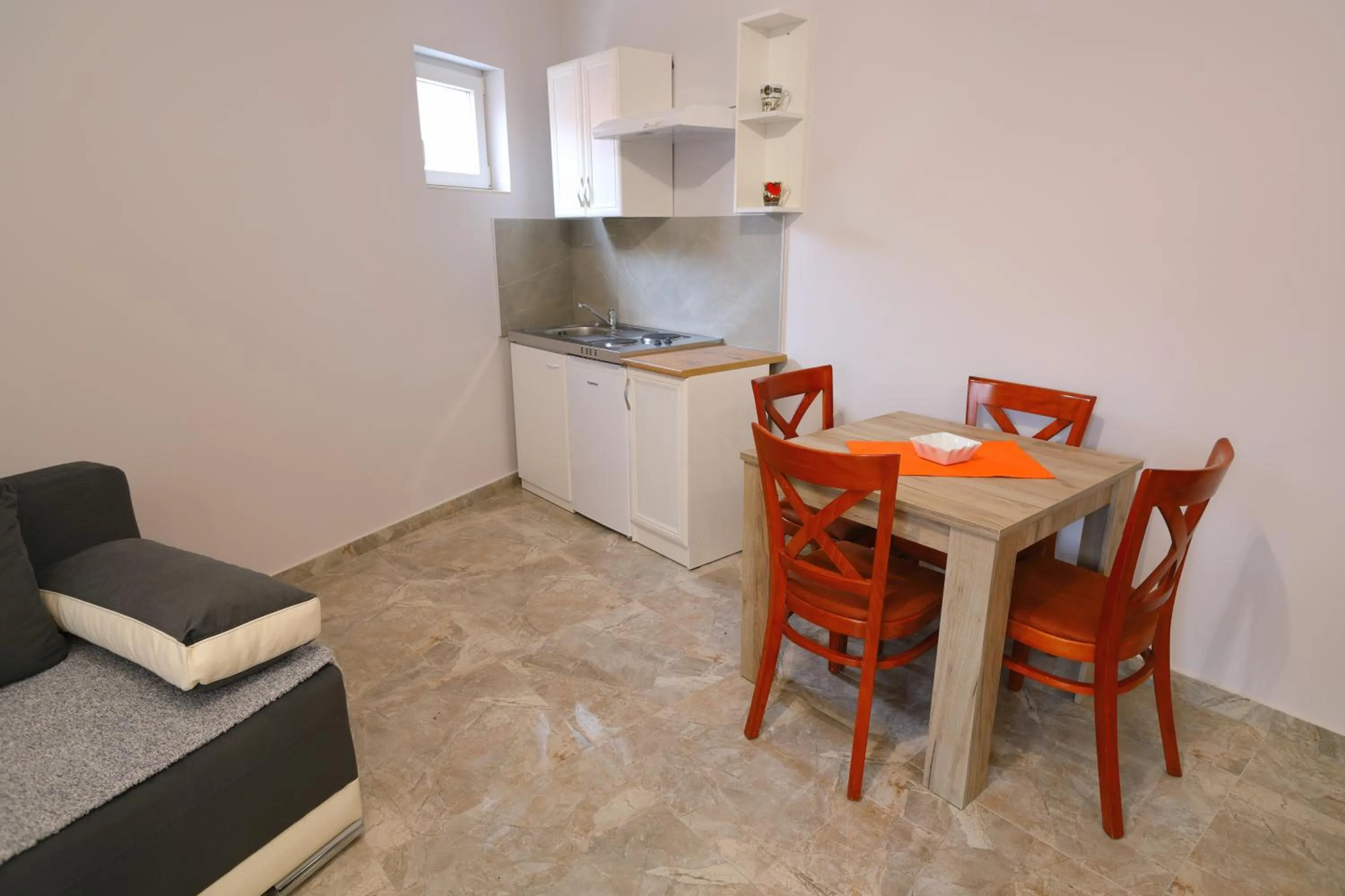 Kitchen or kitchenette in Fenix Apartments