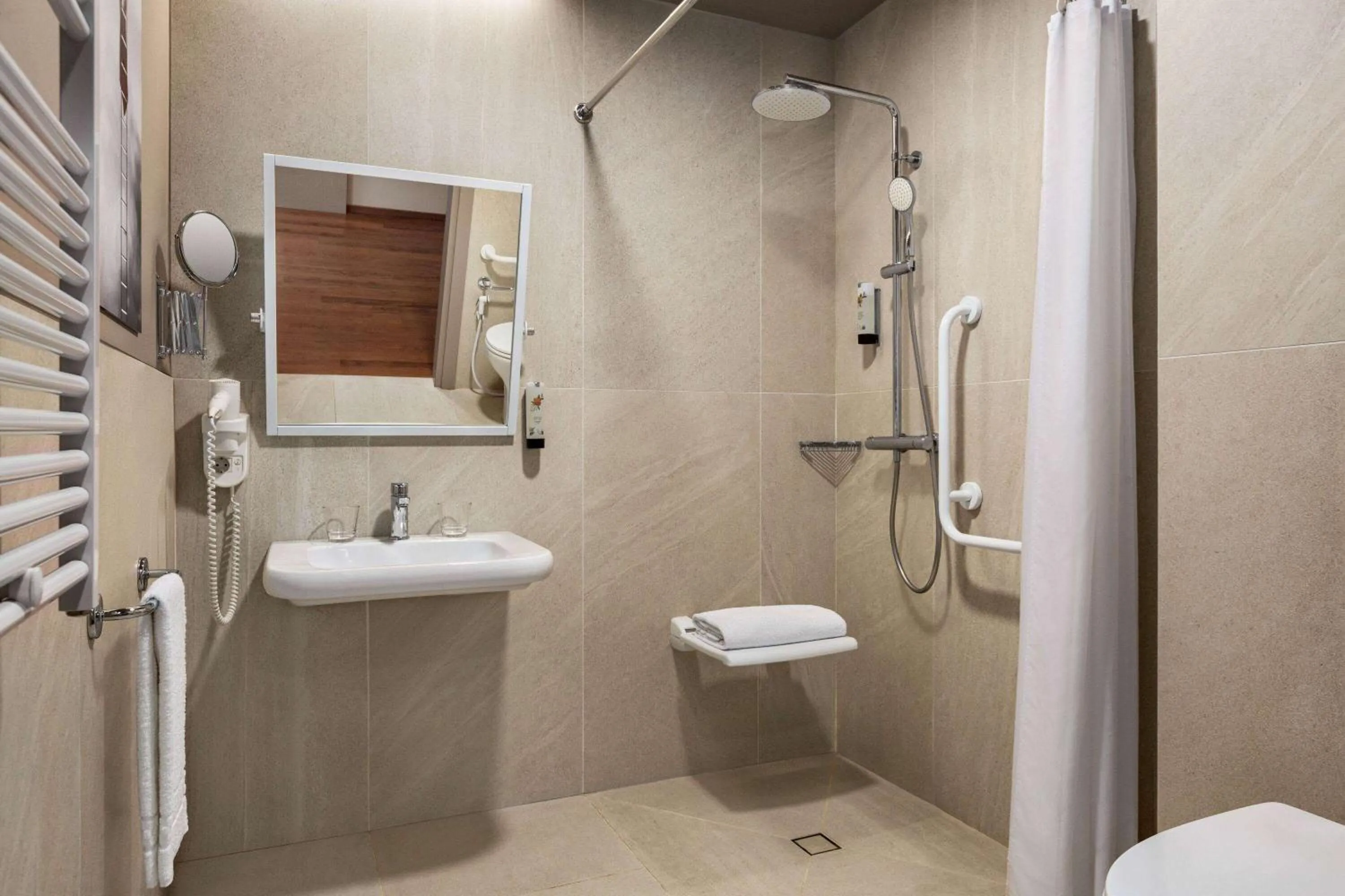 Shower in Amedia Hotel Milan, Trademark Collection by Wyndham