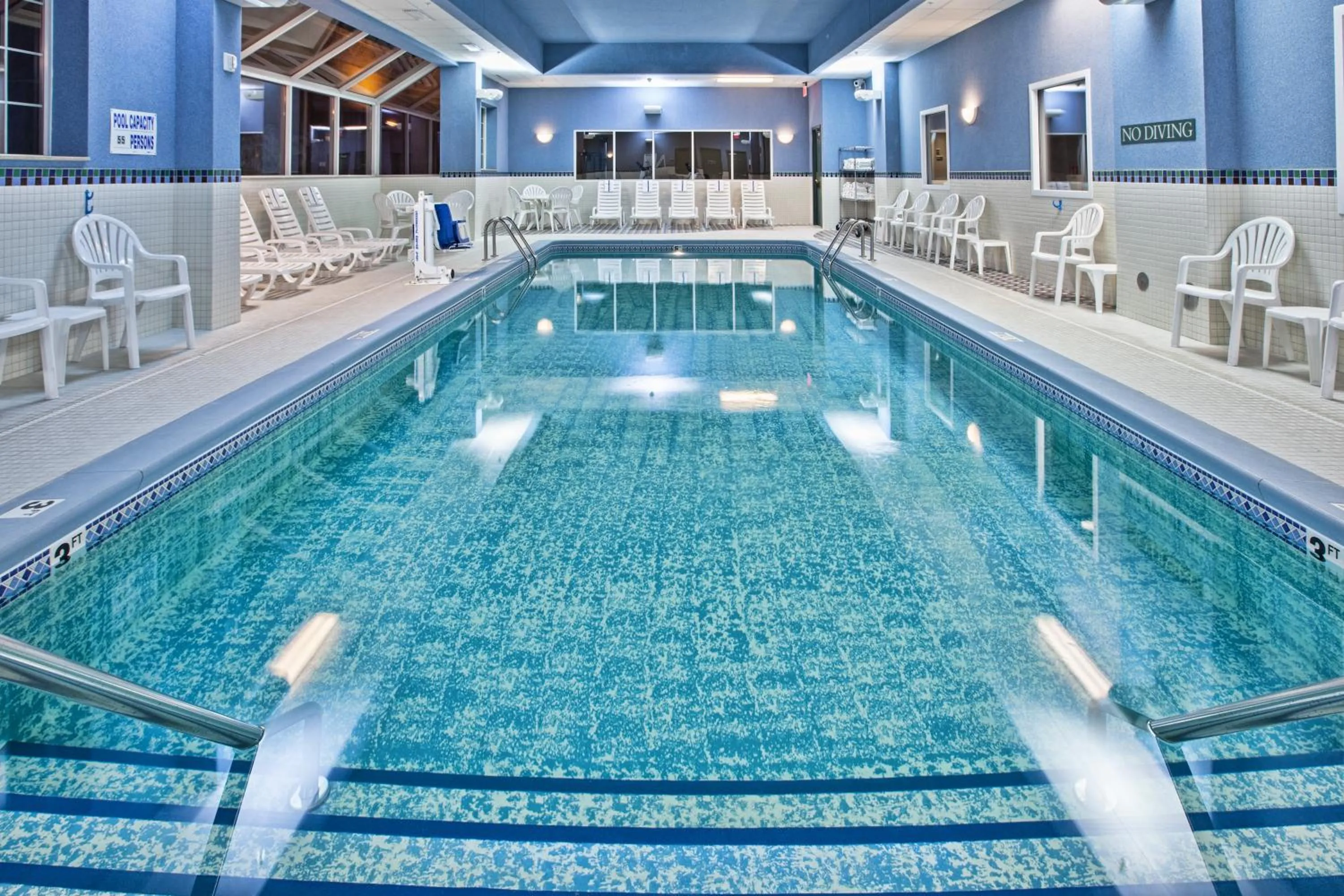 Swimming pool in Country Inn & Suites by Radisson, Grand Rapids East, MI