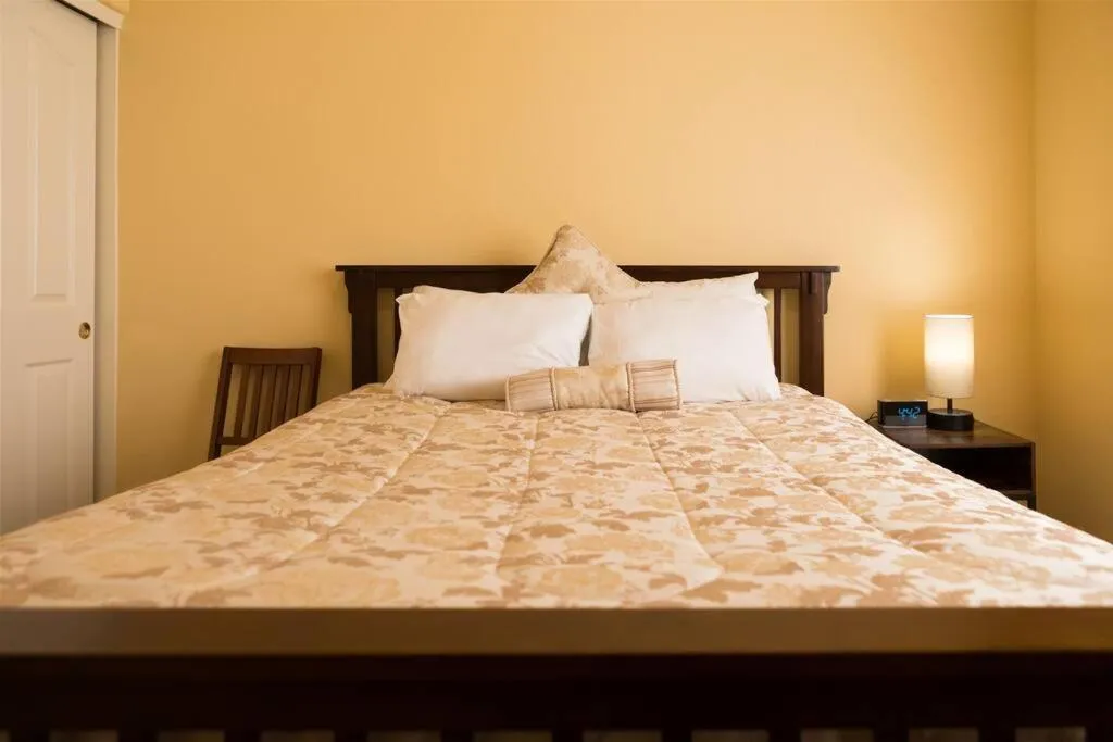 Bed in Spacious golf course house with pool heater, spa