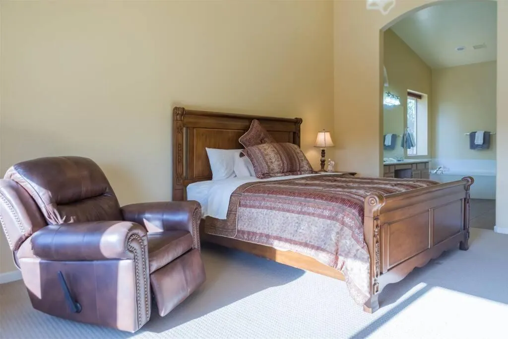 Bed in Spacious golf course house with pool heater, spa