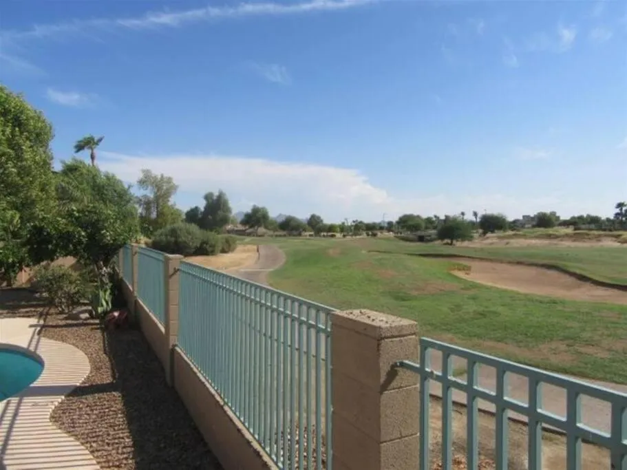 Spacious golf course house with pool heater, spa