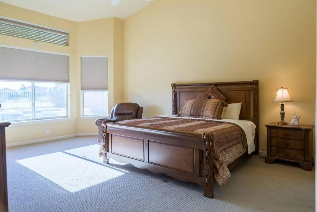 Bed in Spacious golf course house with pool heater, spa