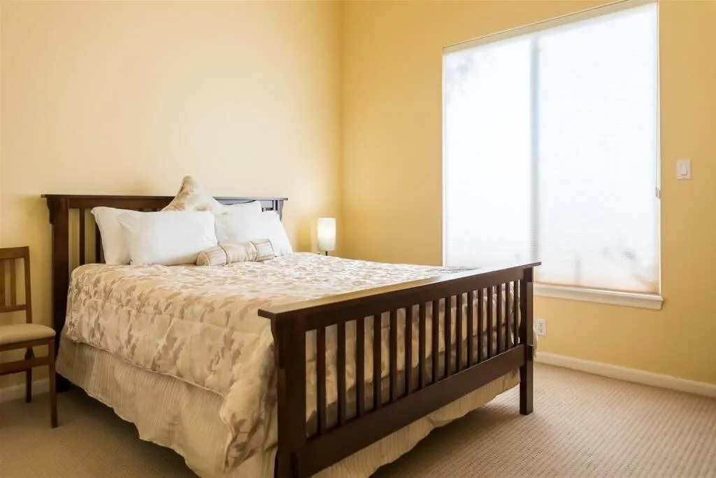 Bed in Spacious golf course house with pool heater, spa