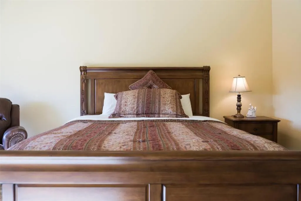 Bed in Spacious golf course house with pool heater, spa